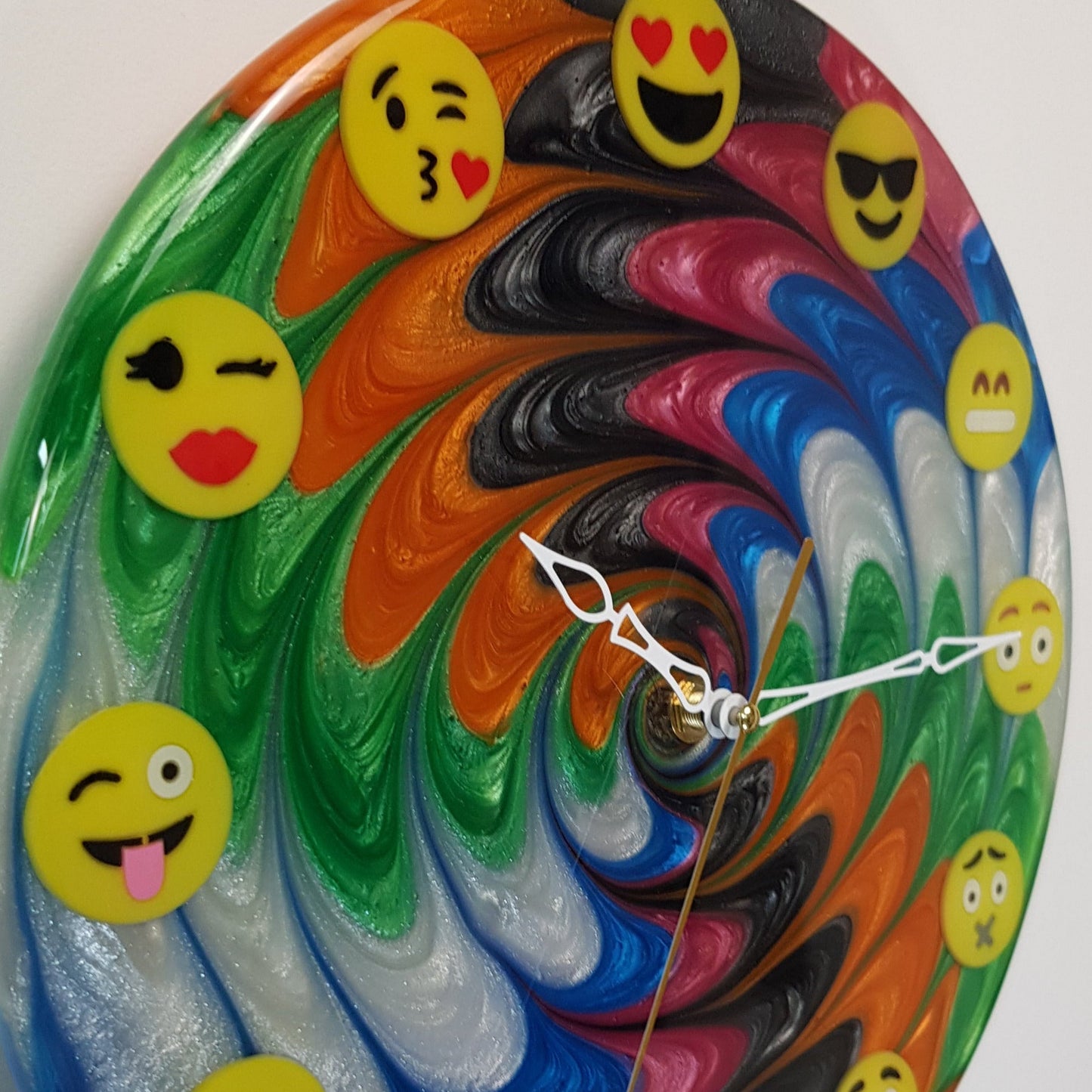 Limited edition resin wall clock – Emotion Flow #04 with hypnotic multicolor resin and emoji hours, close-up