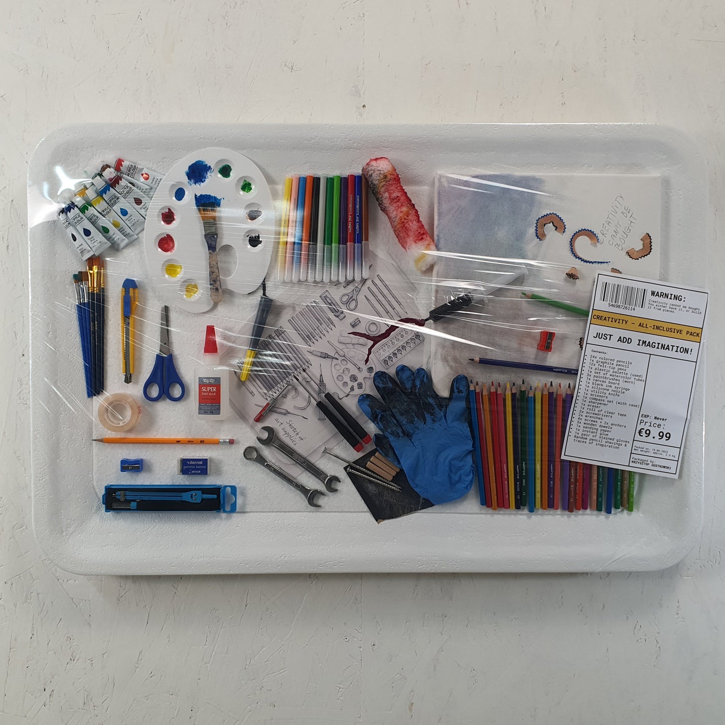 Creatività in Offerta conceptual artwork – blister pack installation filled with art tools, front view