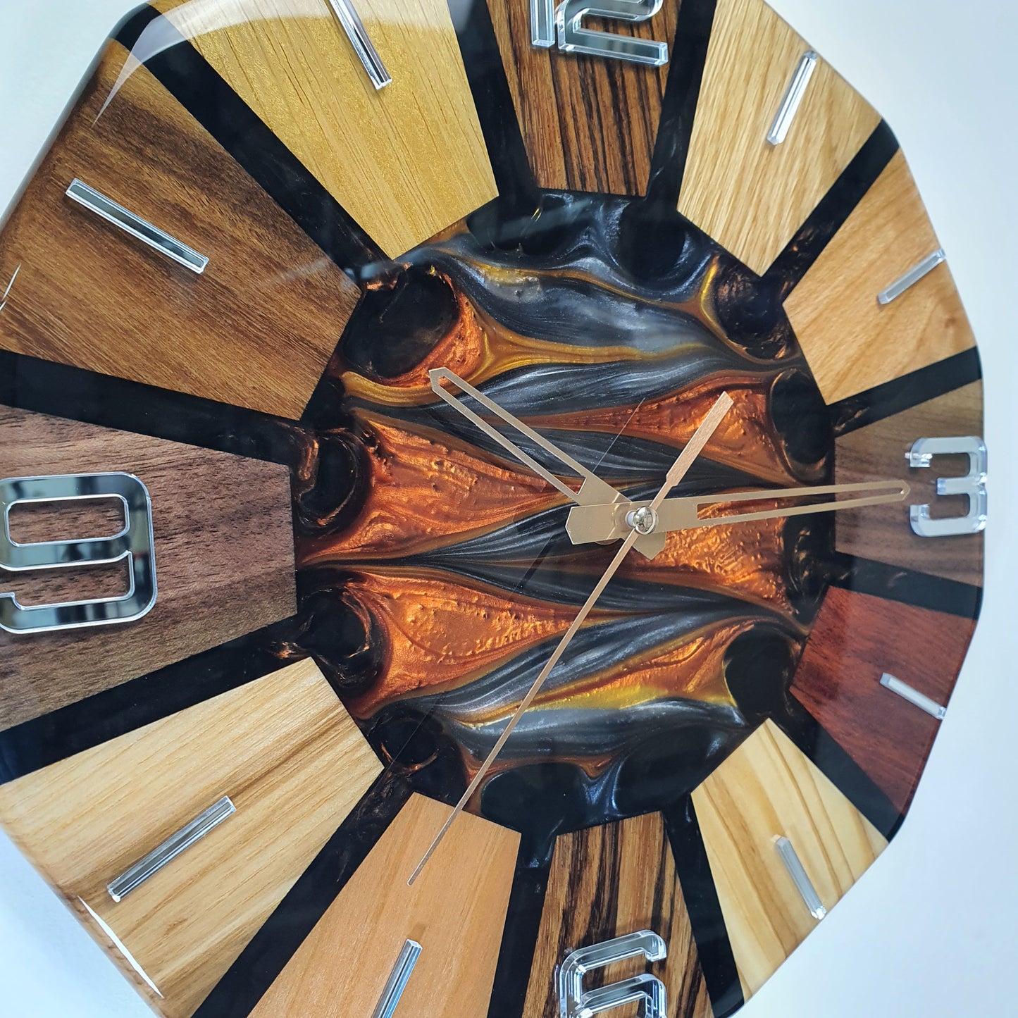 Close-up of the Fire Core Circle clock face – epoxy resin and natural wood details