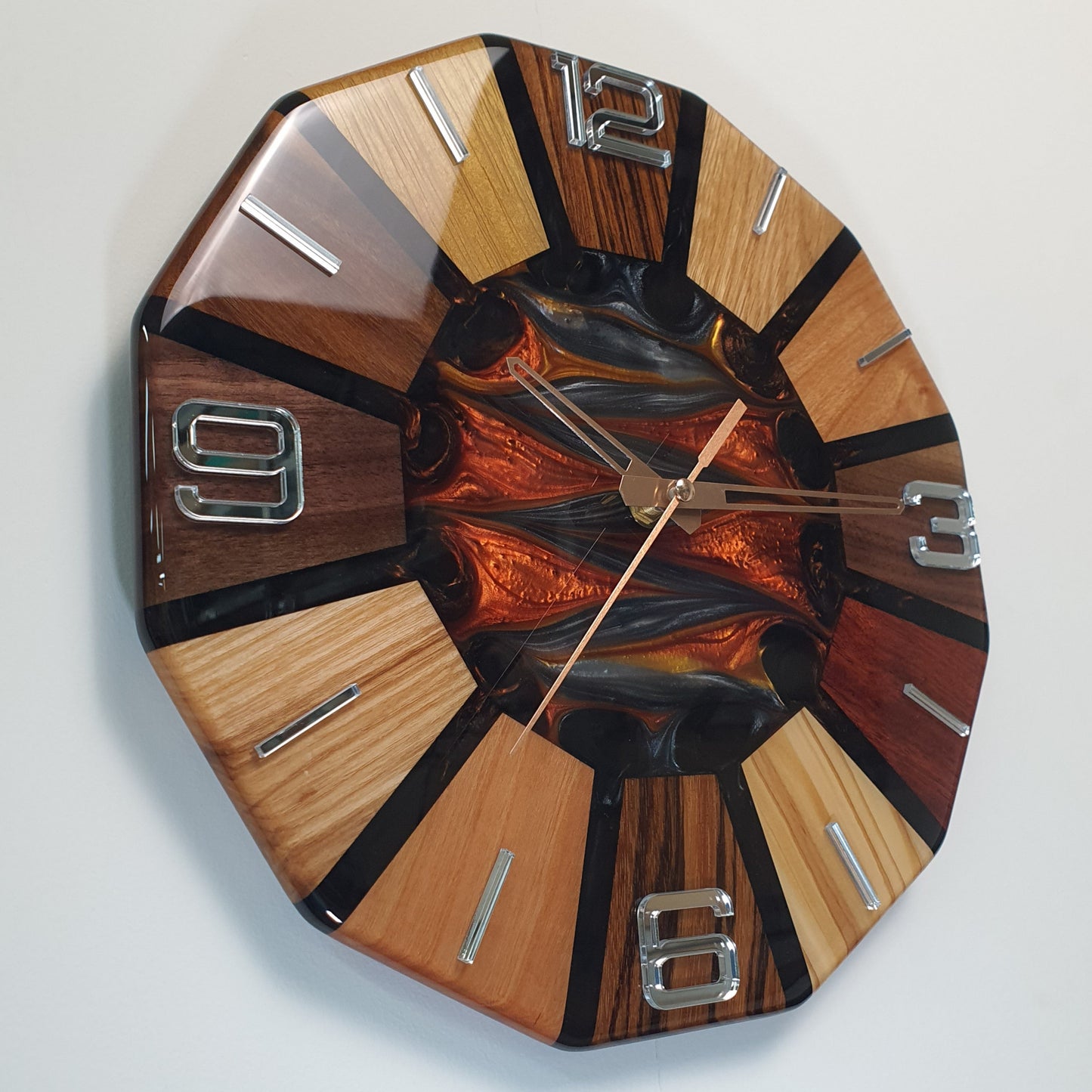 Right side view of the Fire Core Circle clock – wooden segments and glossy finish