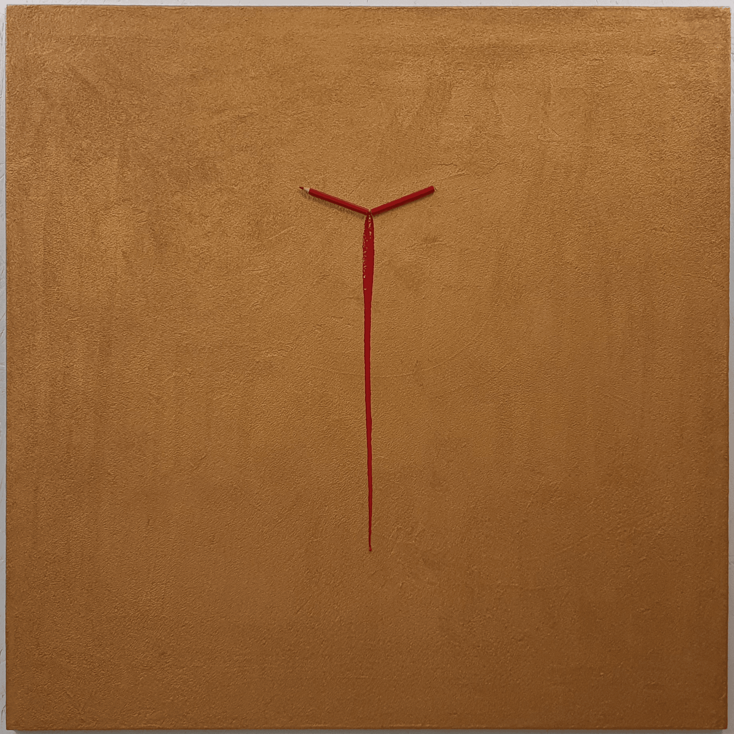 Un Capitolo Nuovo conceptual artwork – broken red pencil on golden background with resin stream, front view