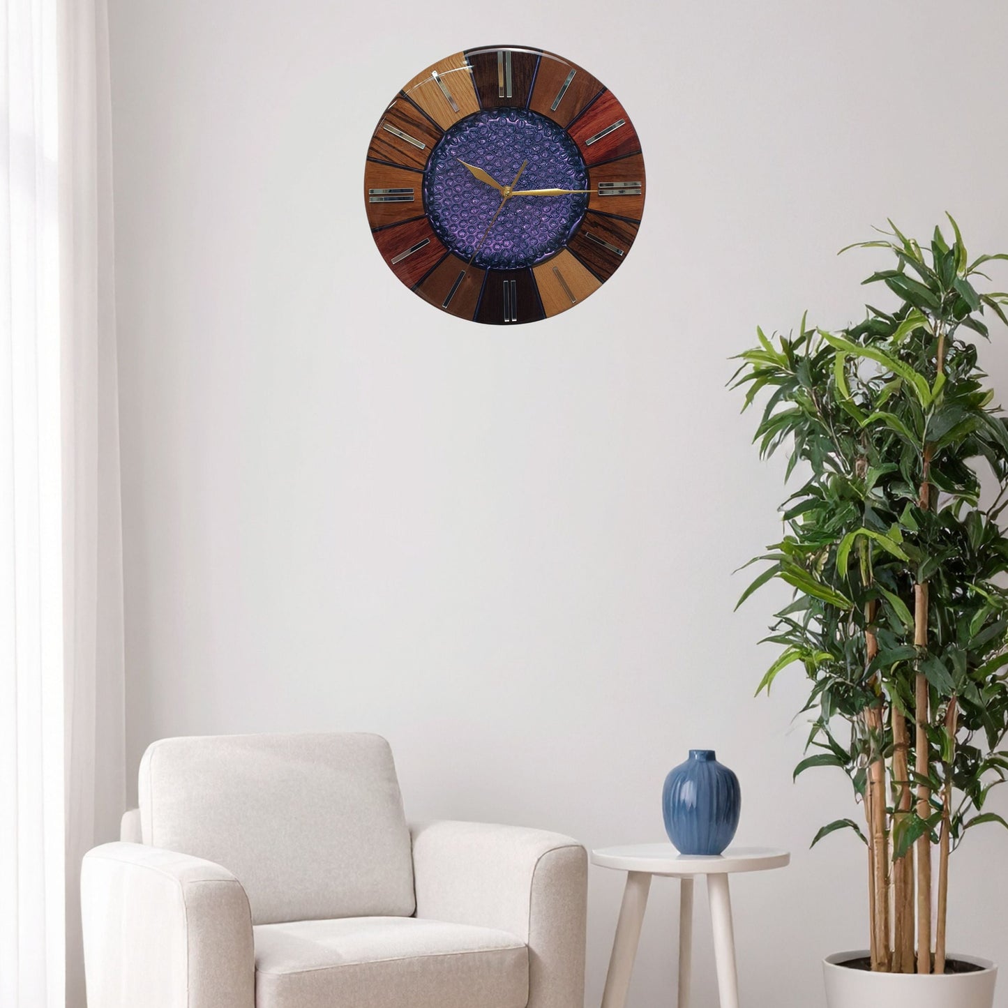The “Cosmic Core” clock hanging on a white wall, glowing with iridescent color and natural warmth