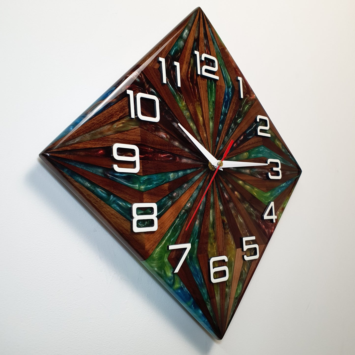 Right side angle of the "Walnut Prism" wall clock – colorful resin flow and wood grain texture