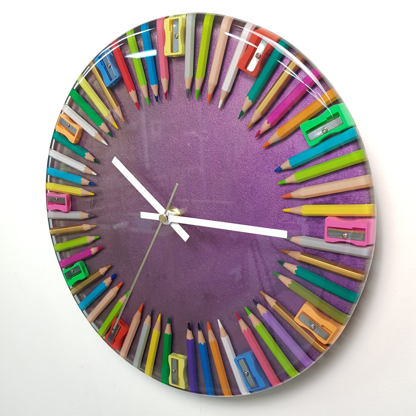 Left side angle showing resin depth and circular form of the handmade wall clock