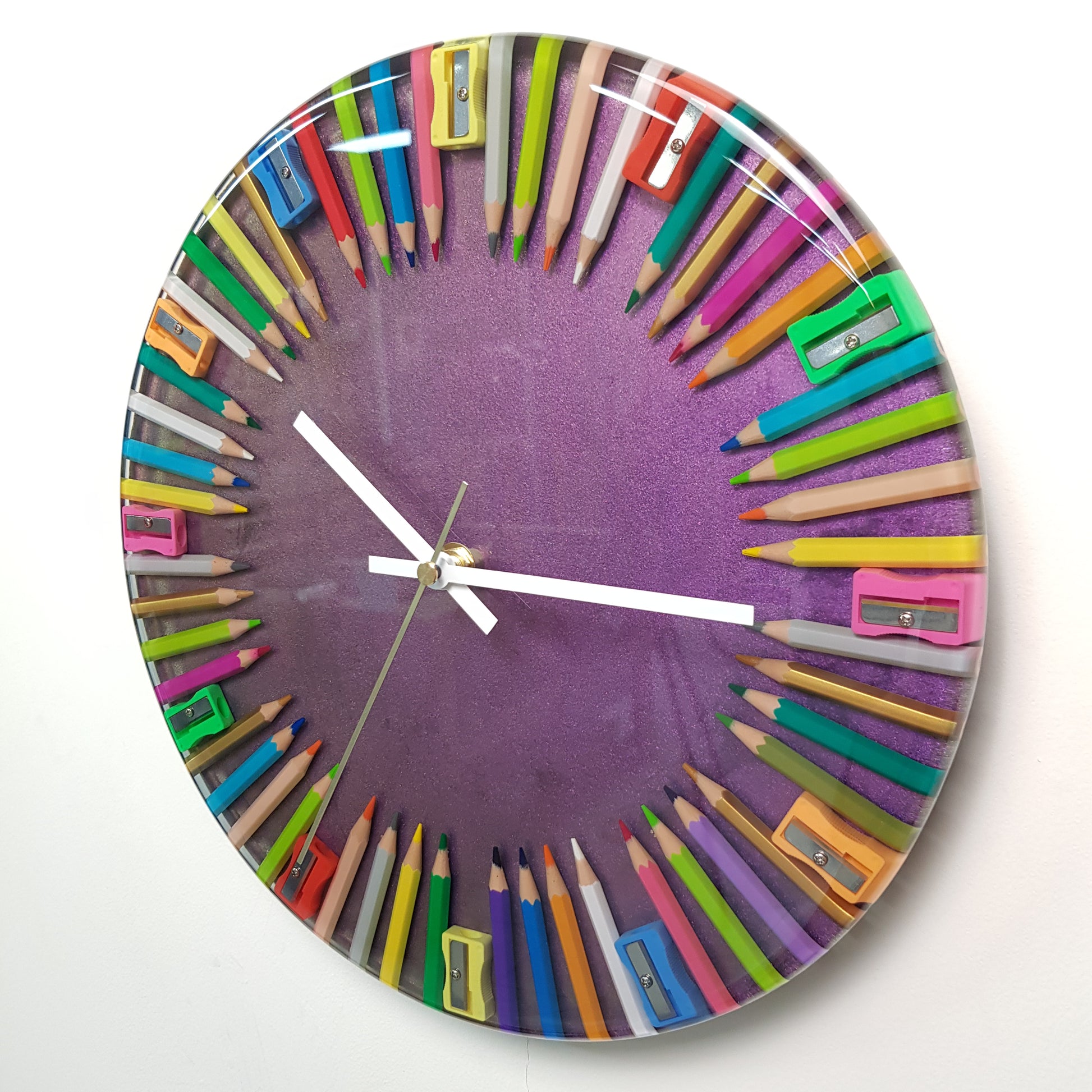Left side angle showing resin depth and circular form of the handmade wall clock