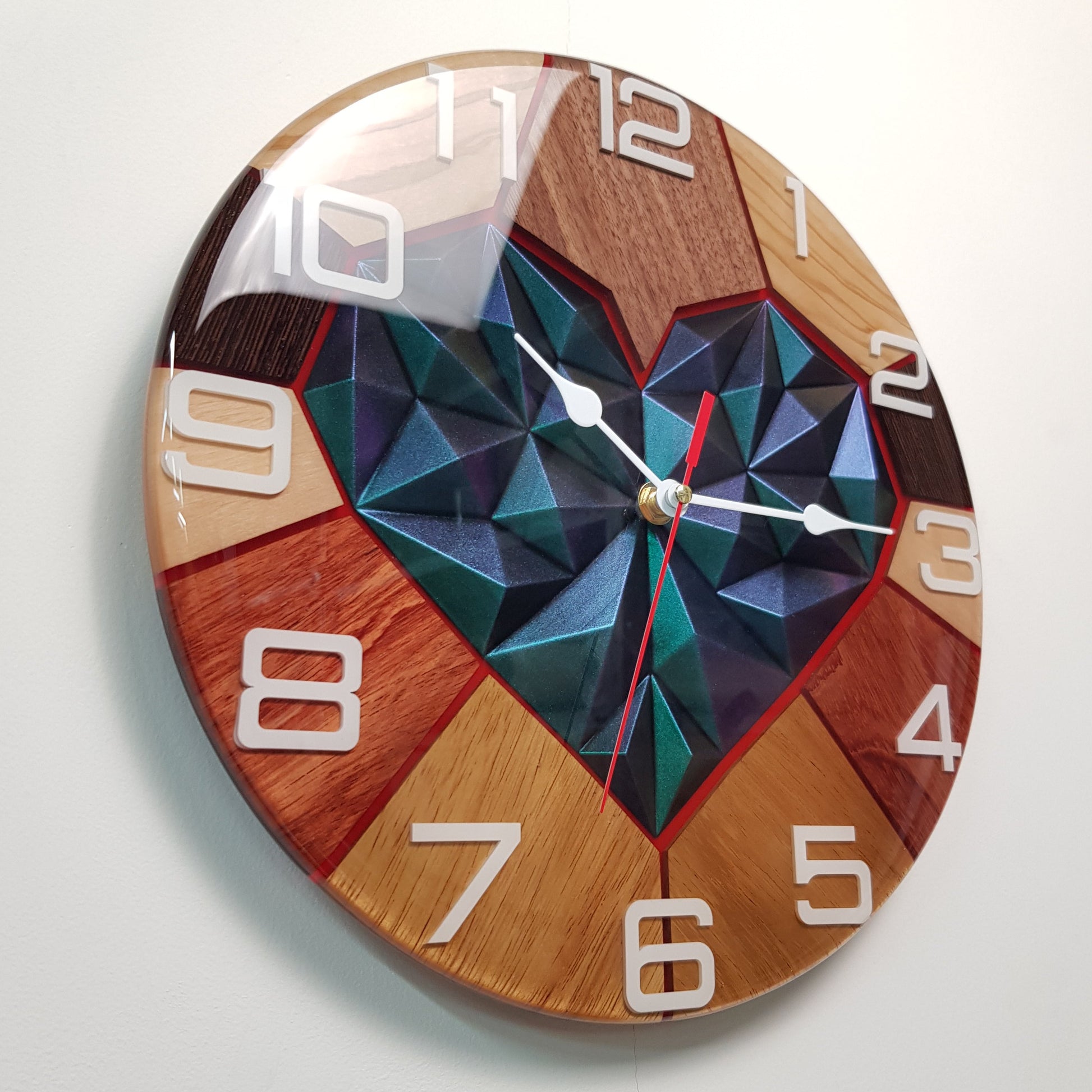 White plexiglass numbers cast into resin with shifting chameleon color reflections