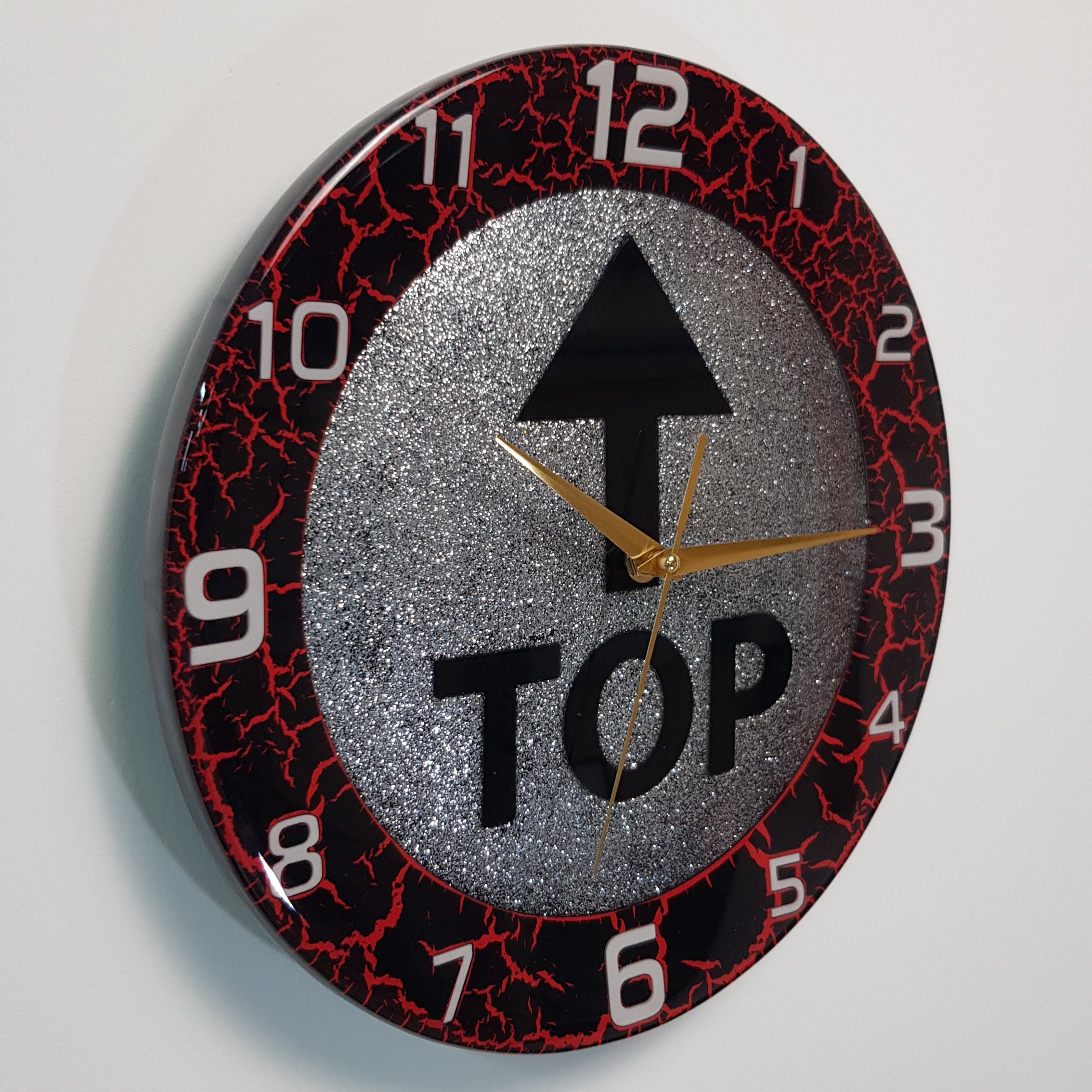 Handmade epoxy resin wall clock – Top Time Silver Spark collectible with bold black arrow, angled photo