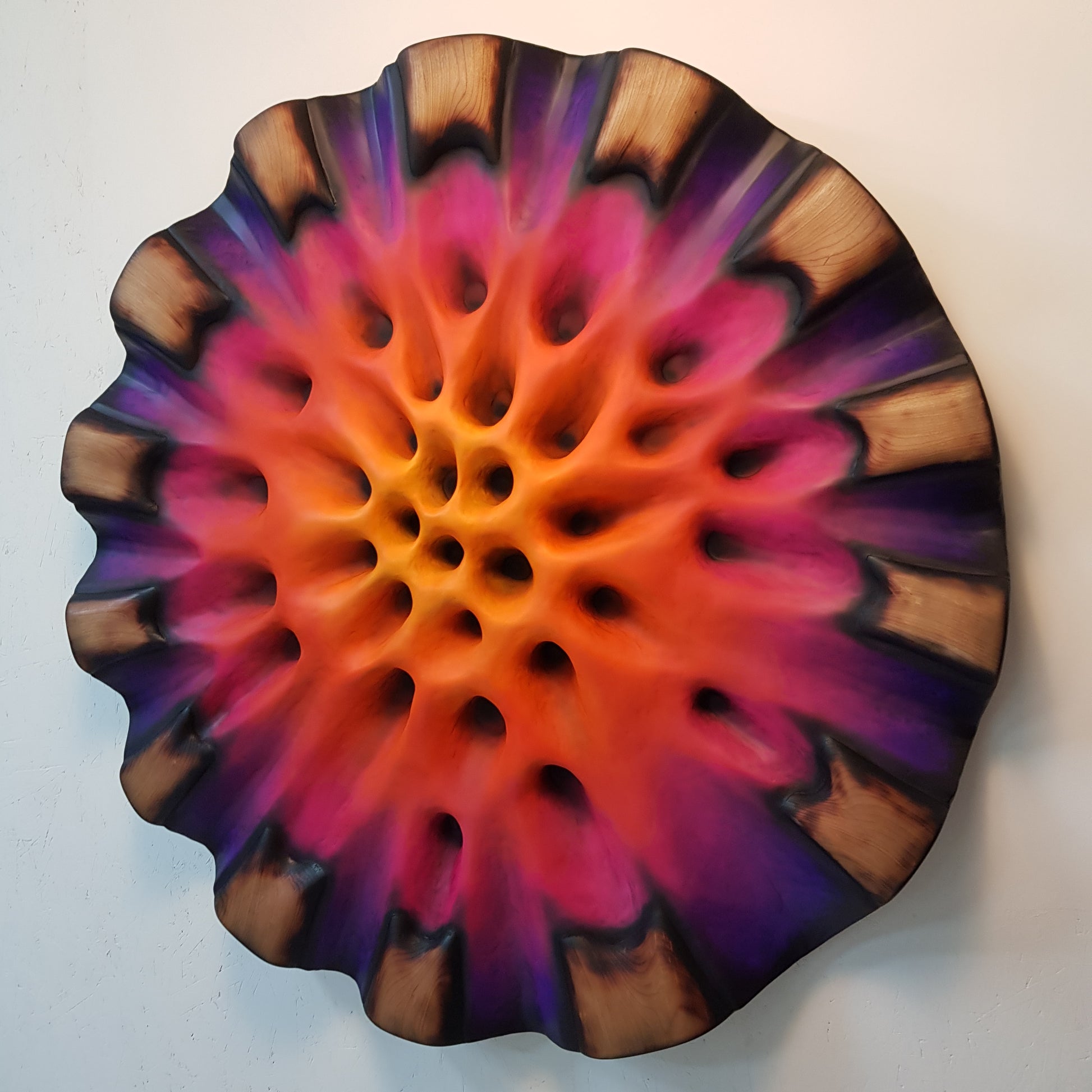 Left side detail of American cherry wood elements with burned finish