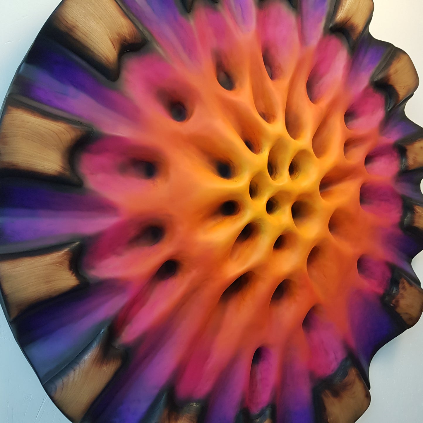 Close-up of textured center showing deep purple and magenta organic structure