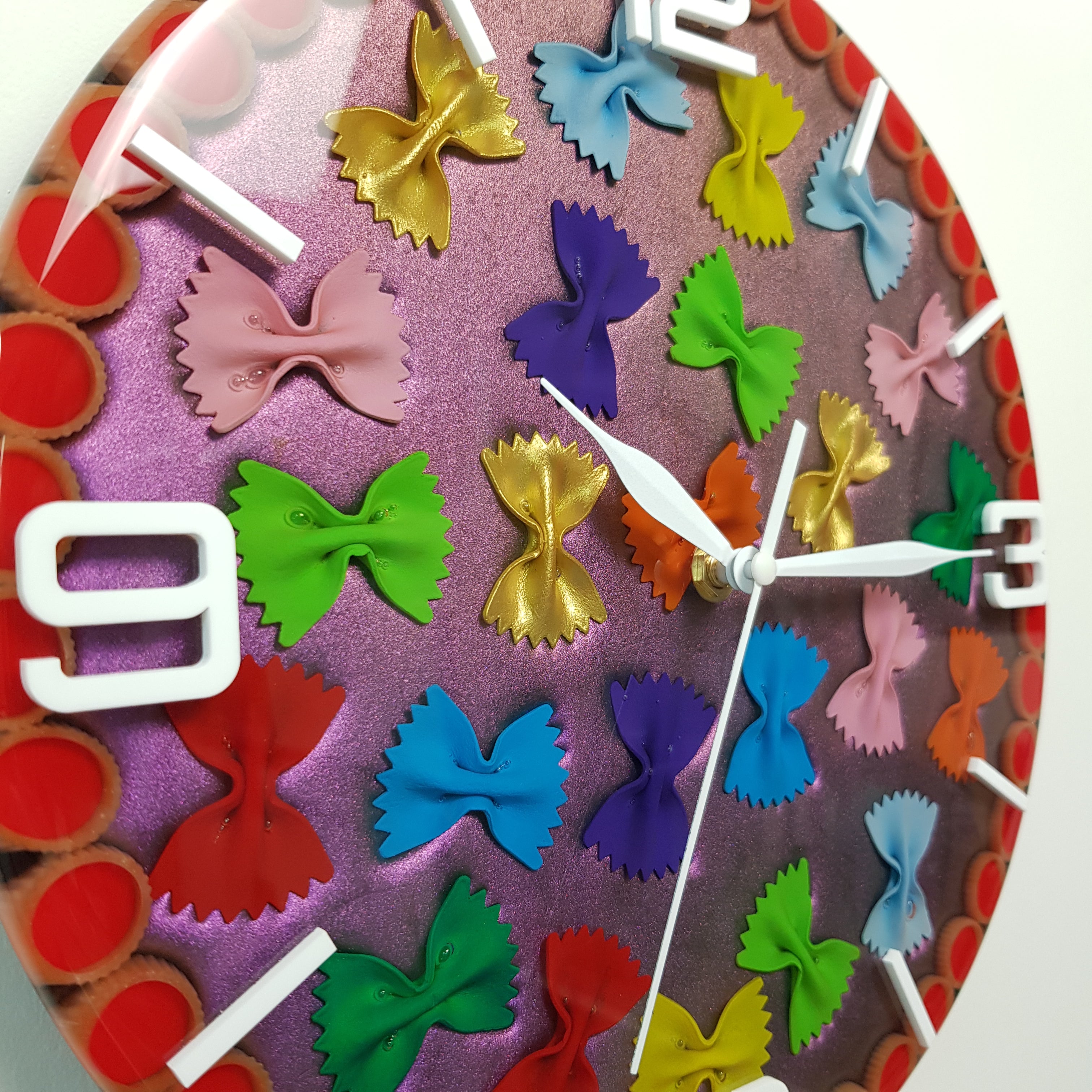 Close-up of Neon Farfalle epoxy resin clock with real farfalle pasta and white plexiglass markers