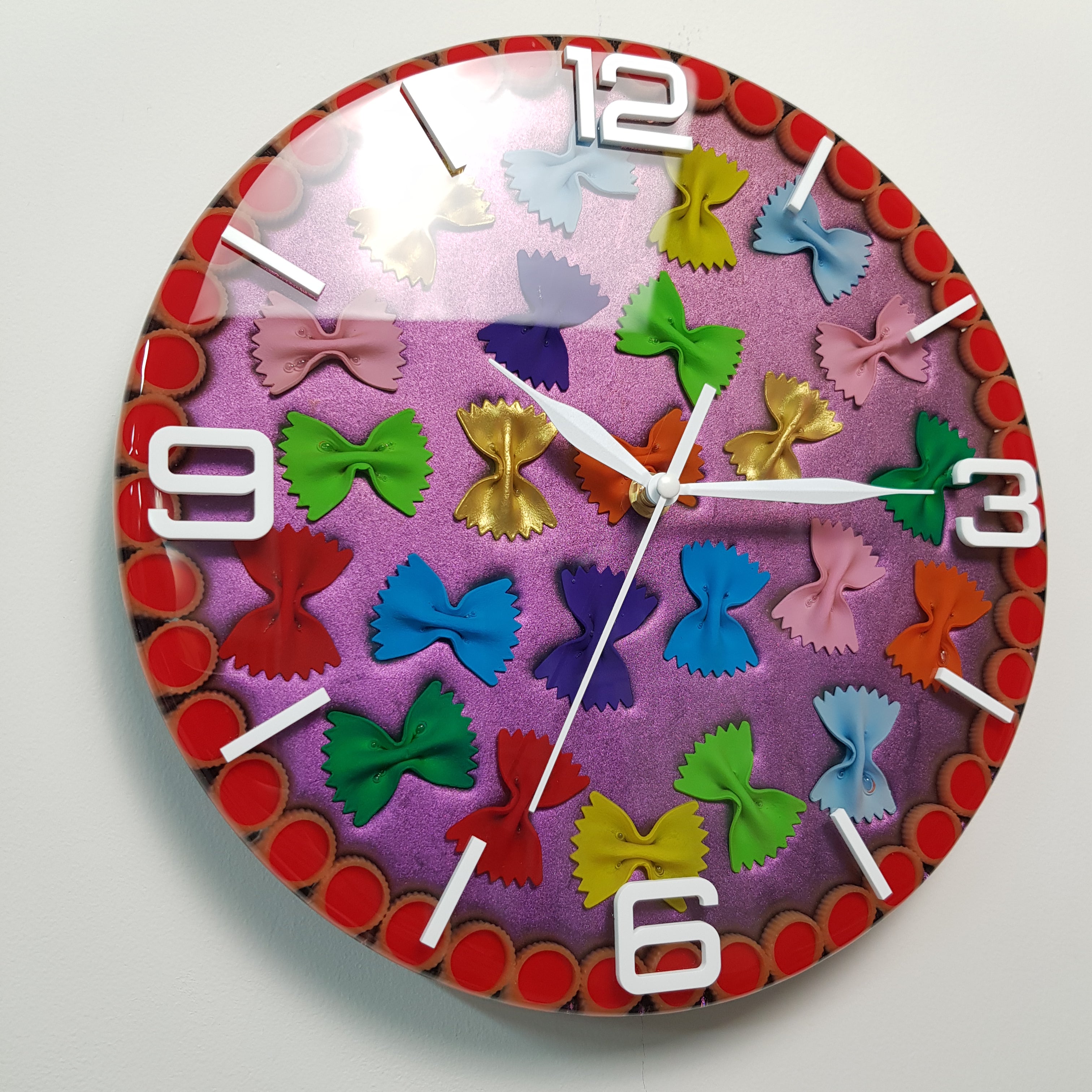 Detailed view of rainbow farfalle pasta composition on shimmering chameleon background