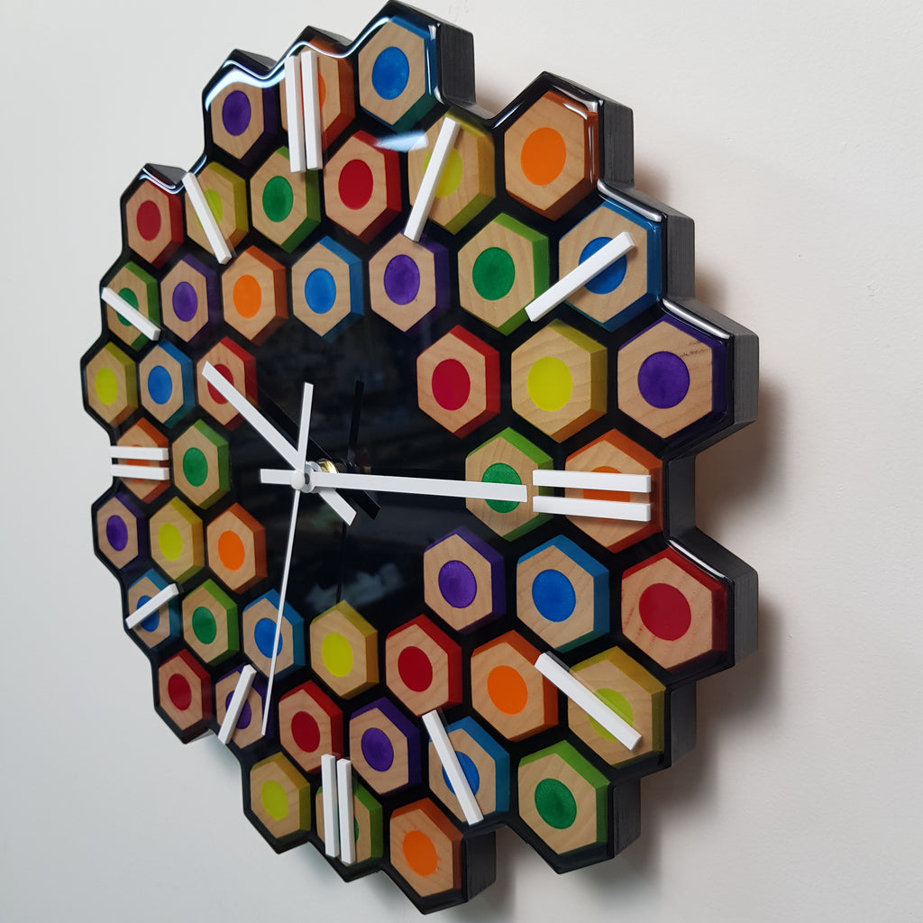 Modern wall clock with colored pencil illusion effect and white markers