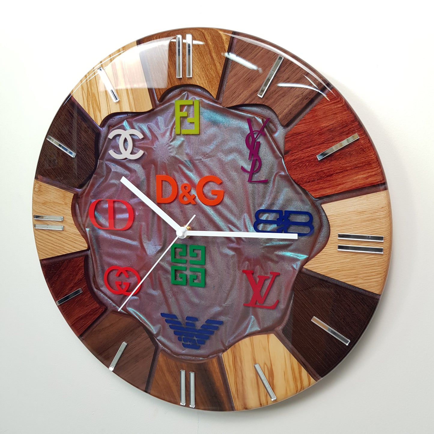 Side angle of the Noble Spectrum clock showing the depth of resin and wooden segments