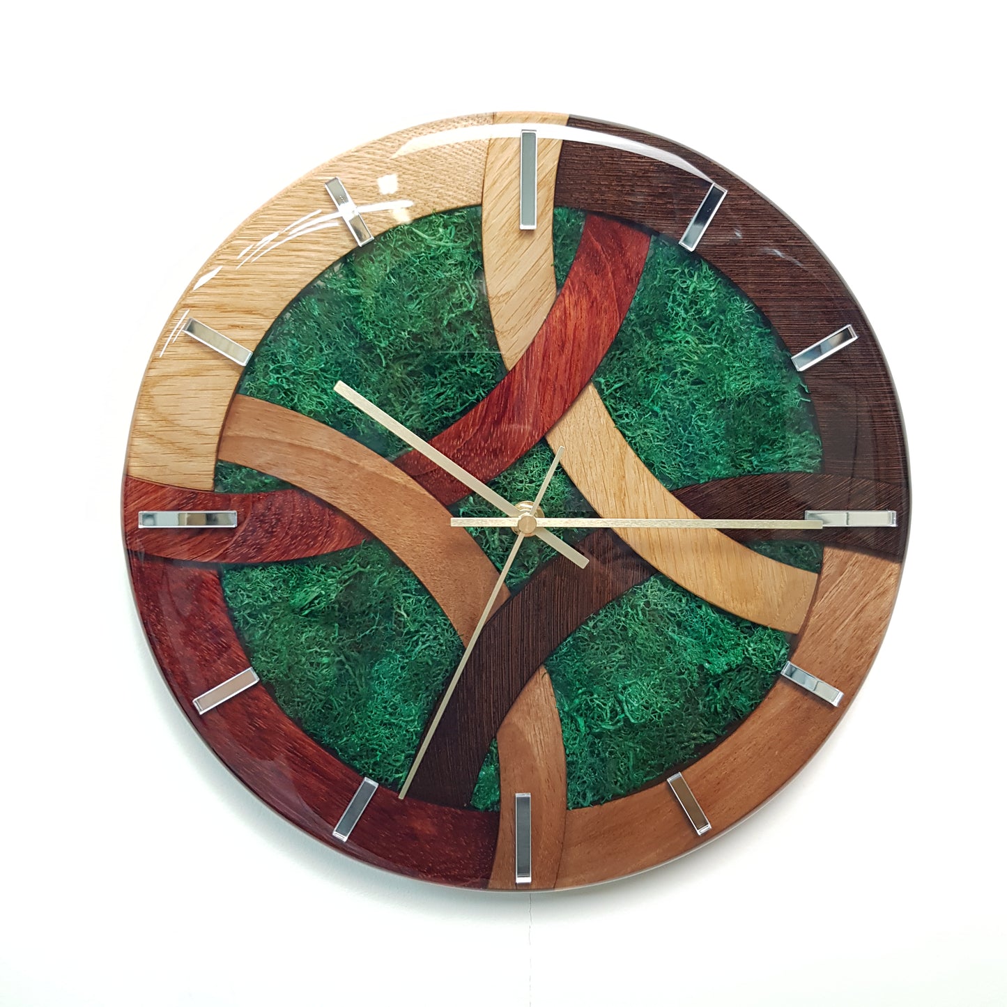 Front view of the “Wood Line – Green Interlock” wooden wall clock