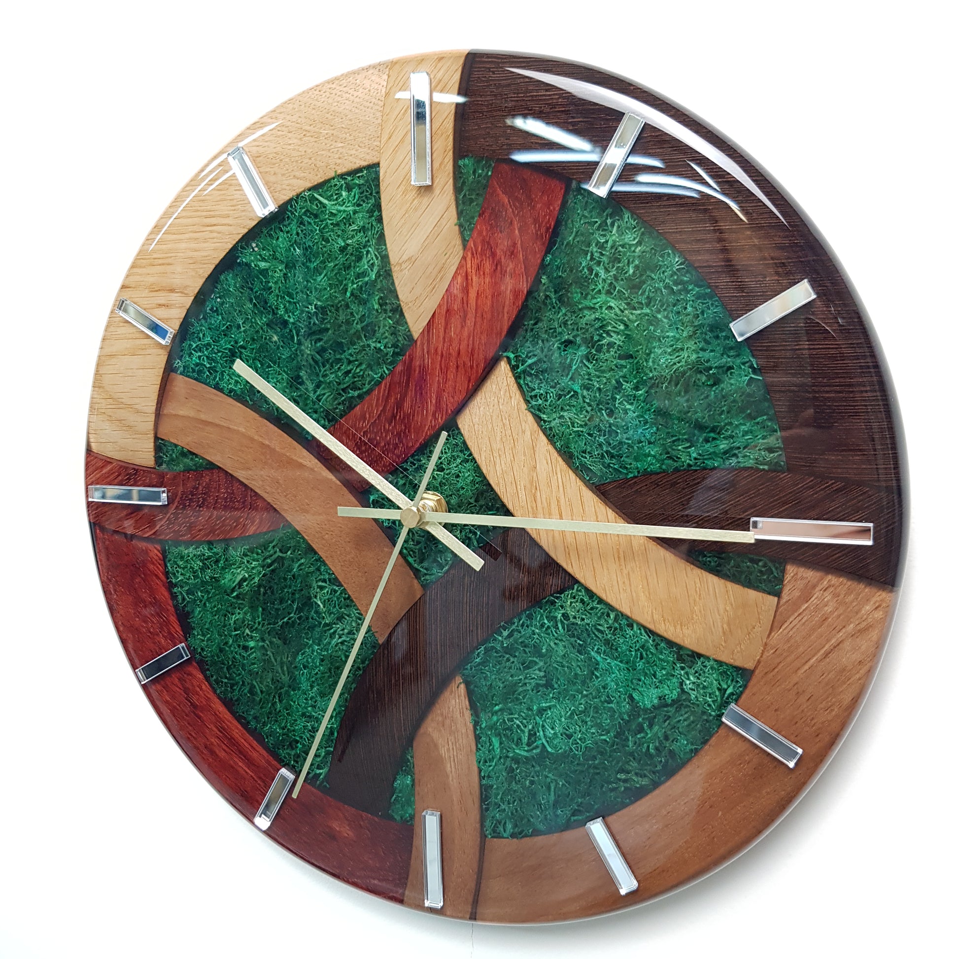 Close-up focused on the moss core and interlocking wooden segments