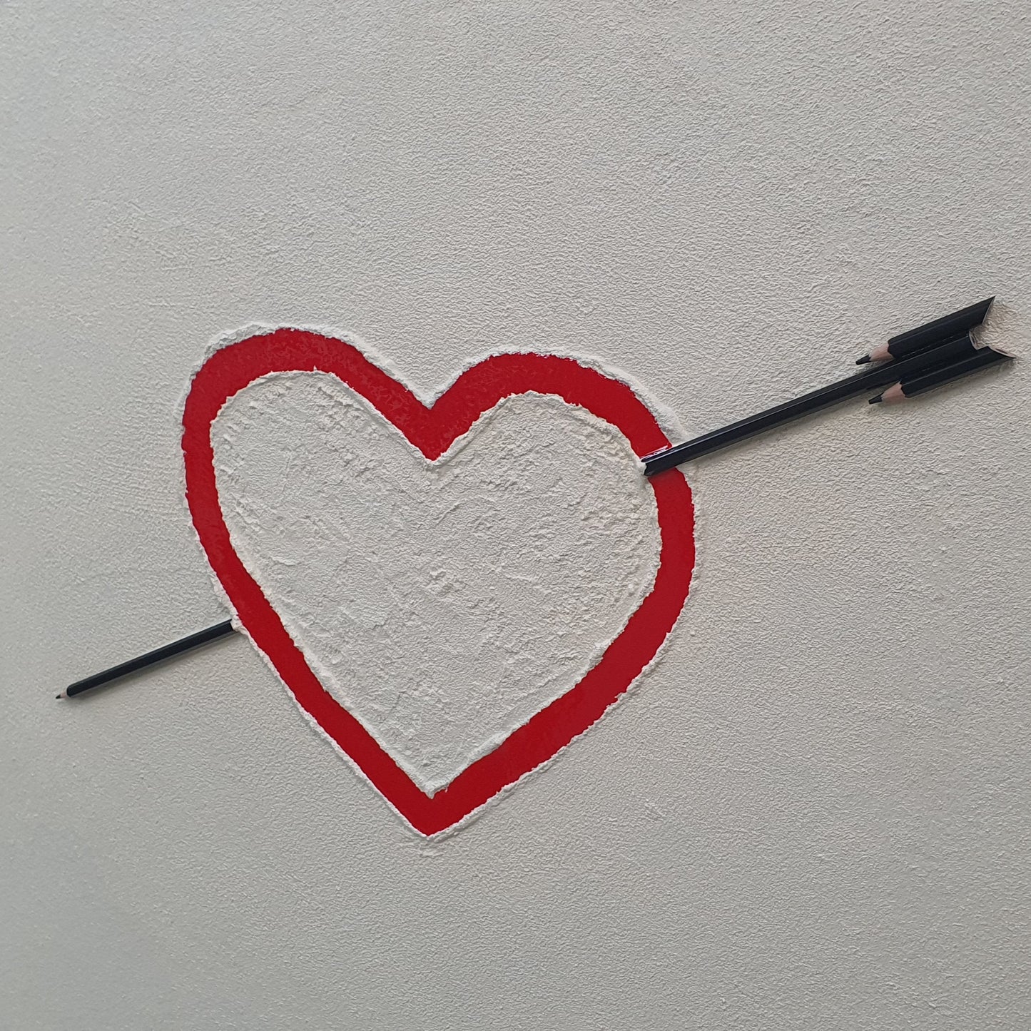 Unique contemporary artwork La Matita nel Cuore – handmade resin and pencil installation with symbolic heart, angled photo