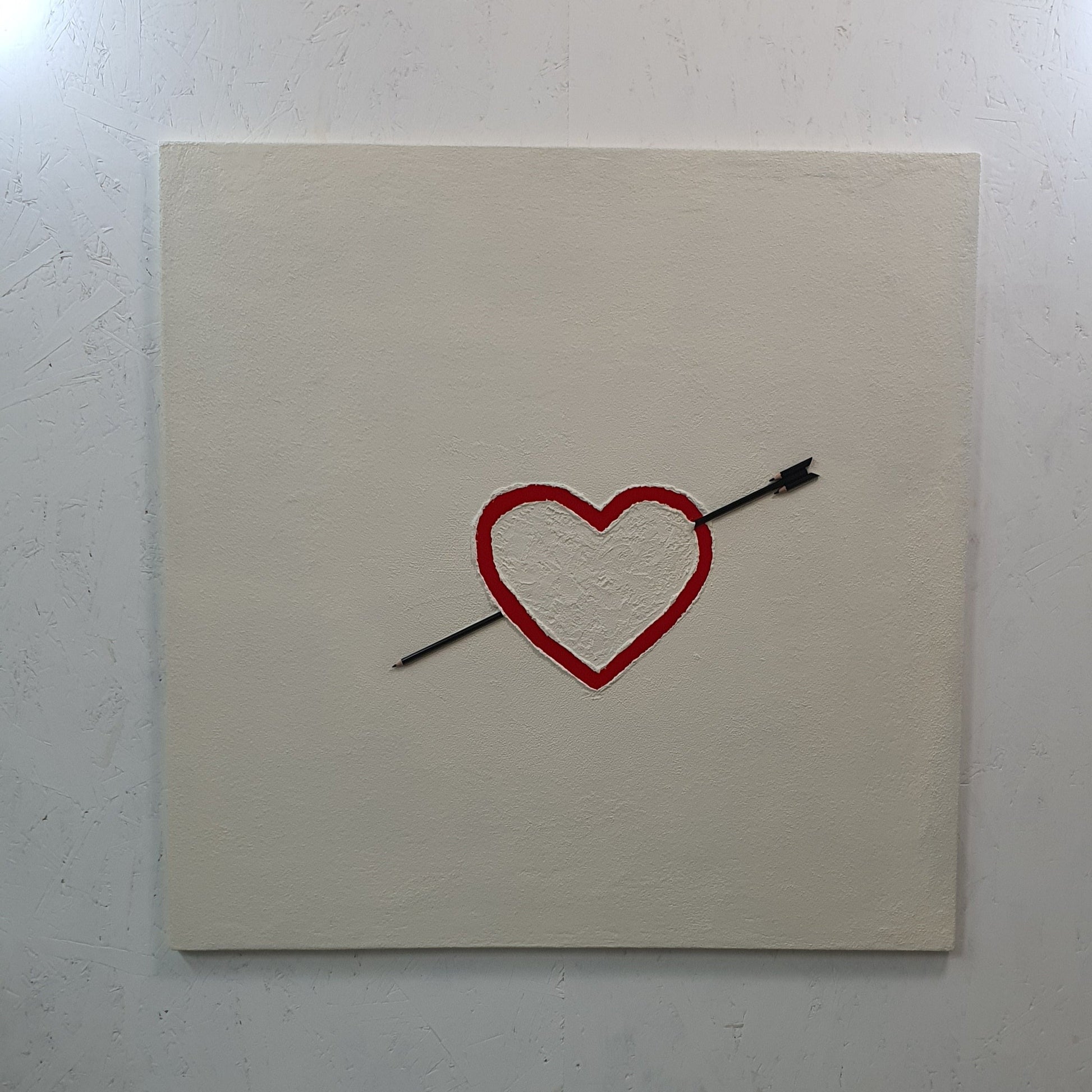 La Matita nel Cuore contemporary conceptual art – red heart with pencil arrow, resin and jesmonite installation