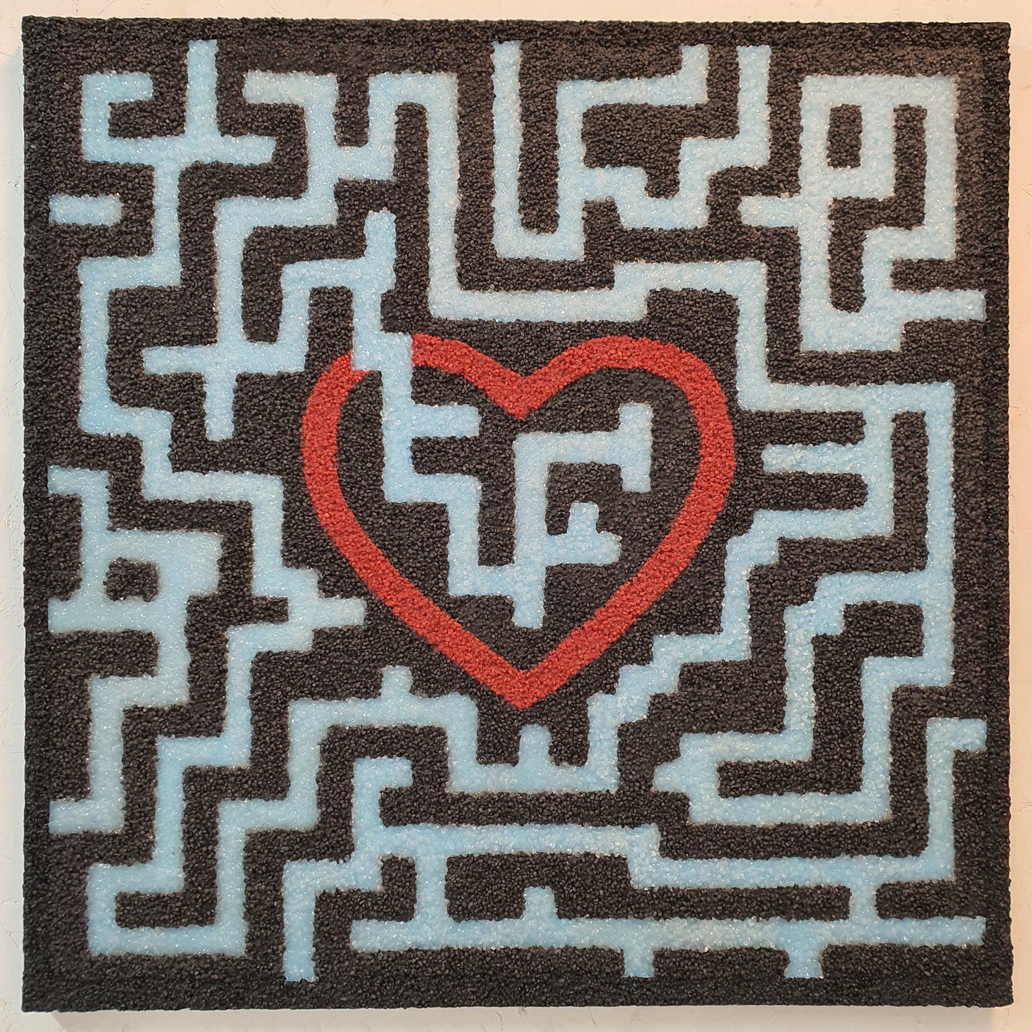 Unique contemporary art piece Trovami – handmade labyrinth installation with fluorescent quartz stones, angled photo