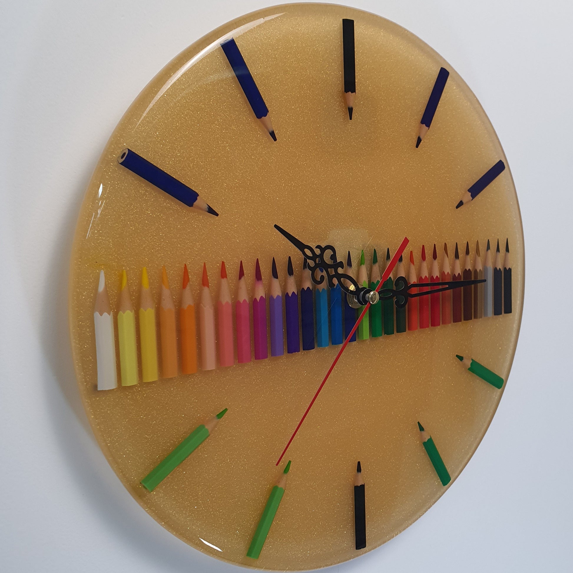 Side angle of resin wall clock showing 3D colored pencil texture