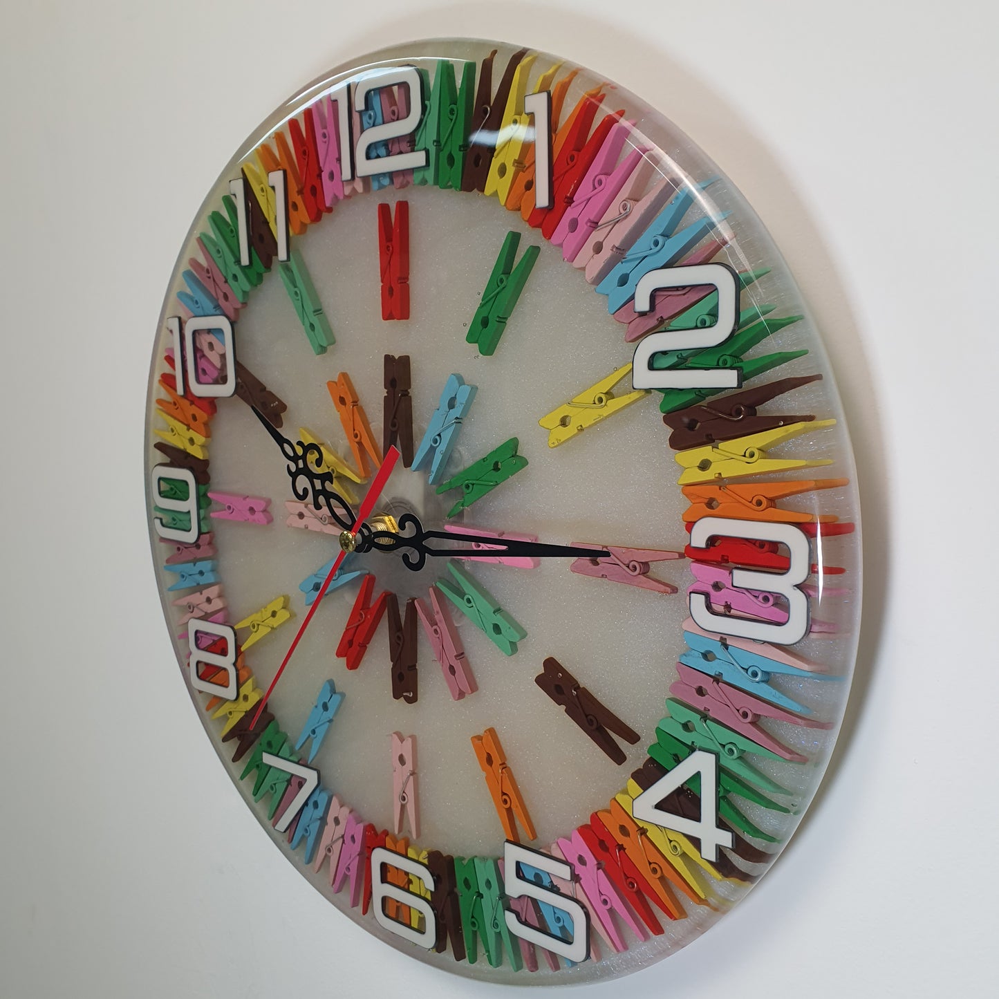 Side angle showing the depth and colorful detail of the peg design