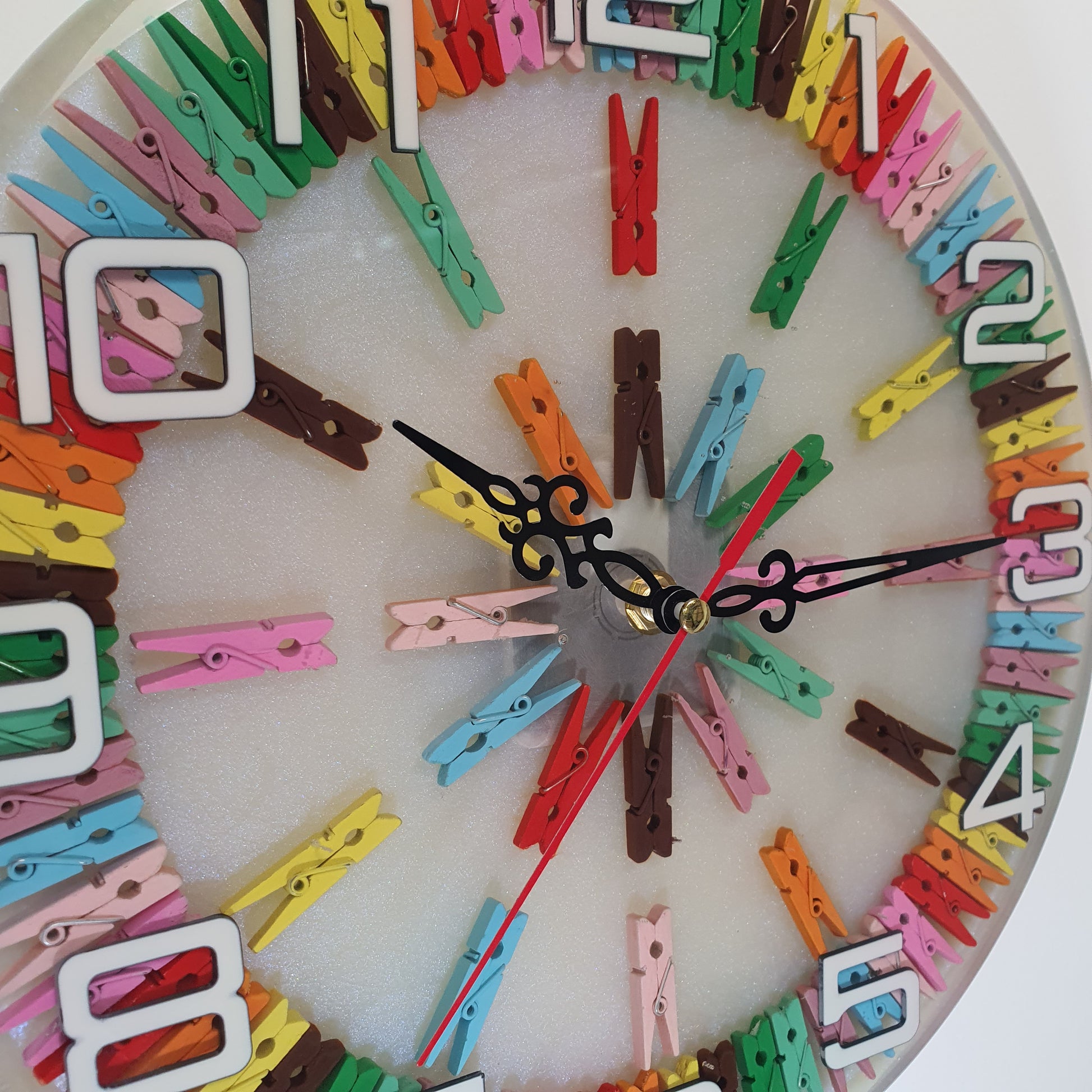 Close-up of the colorful pegs embedded in epoxy resin
