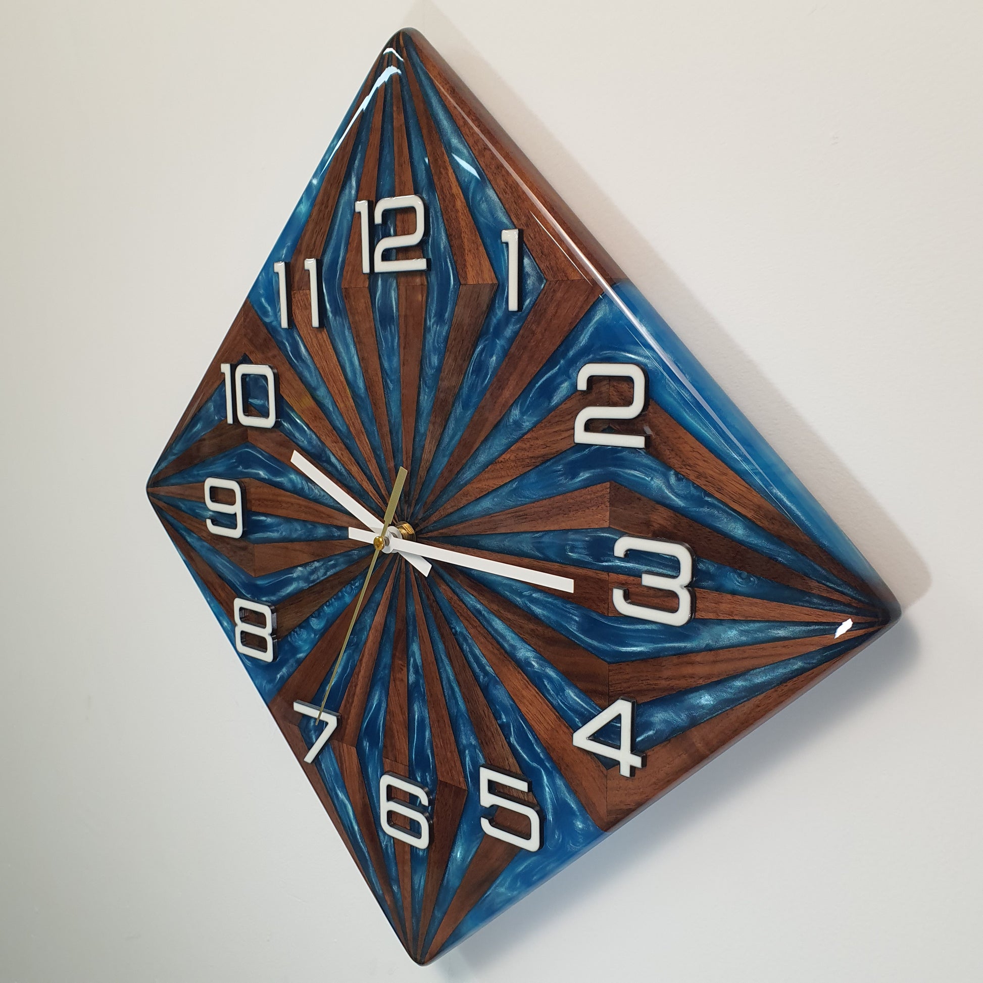 Side angle of the Walnut Wave clock – layered epoxy and walnut wood in elegant craftsmanship