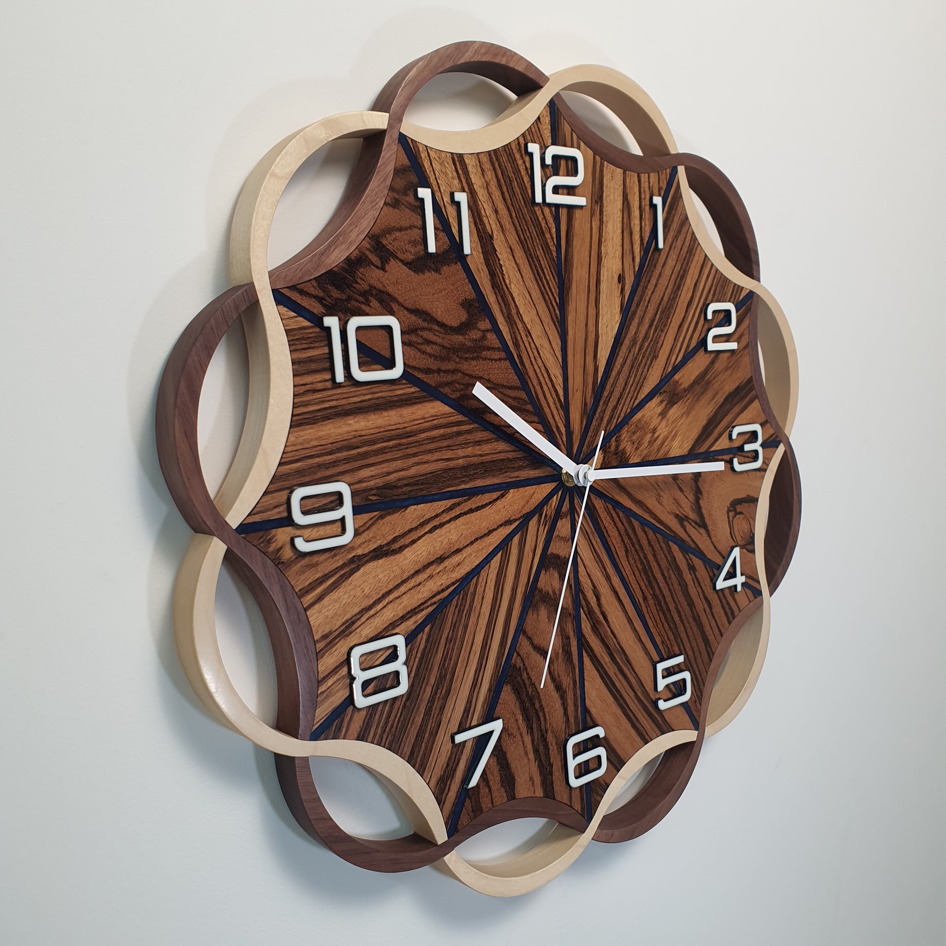 Right side perspective of the Crown Circle clock – highlighting wood texture, resin lines, and elegant build.