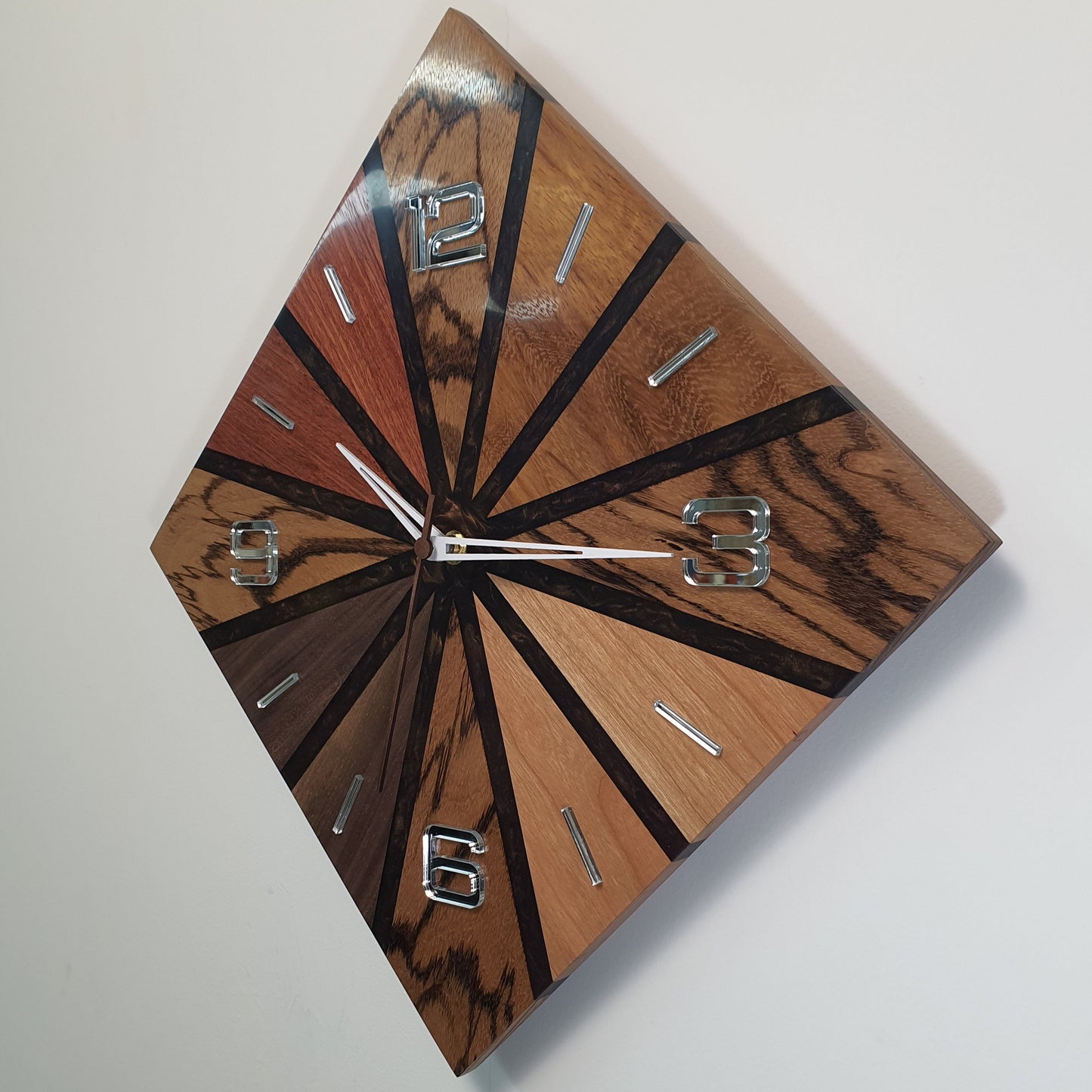 Left side view highlighting the polished surface and mirrored number