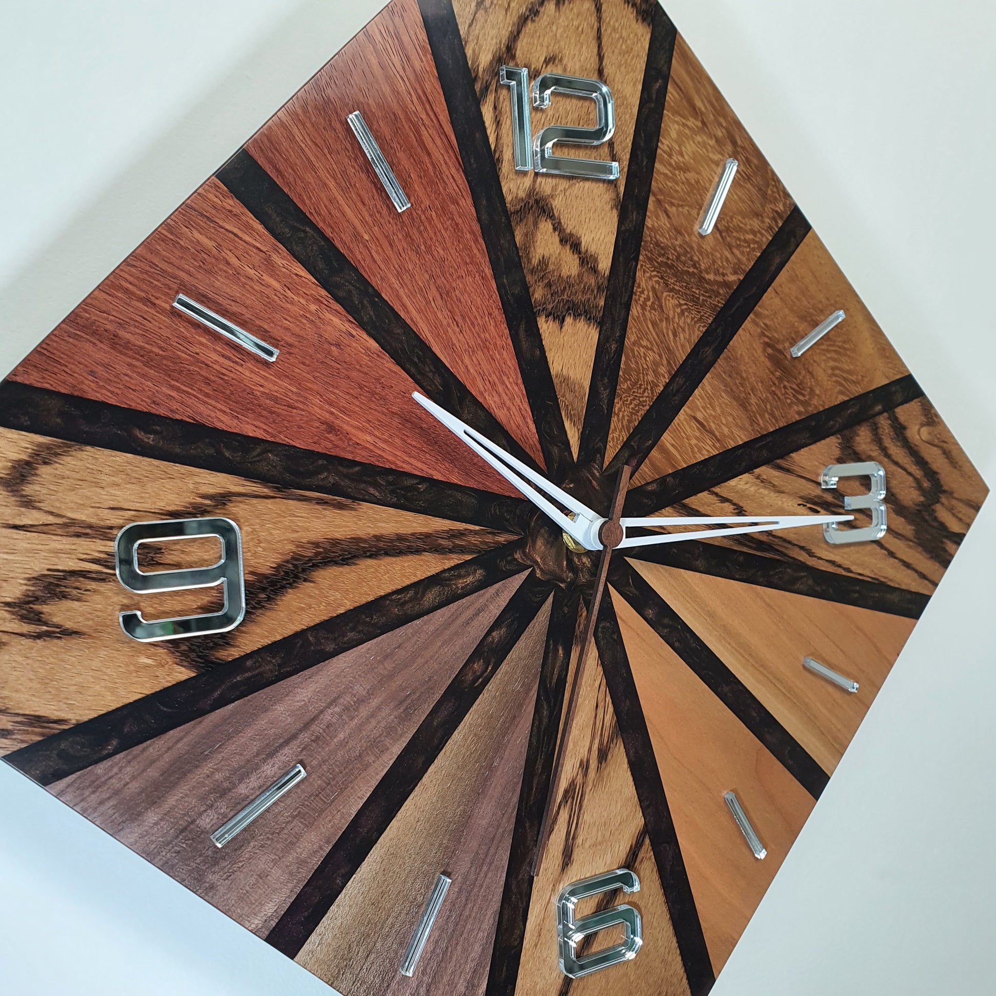 Close-up of the handcrafted wood segments and brown resin details