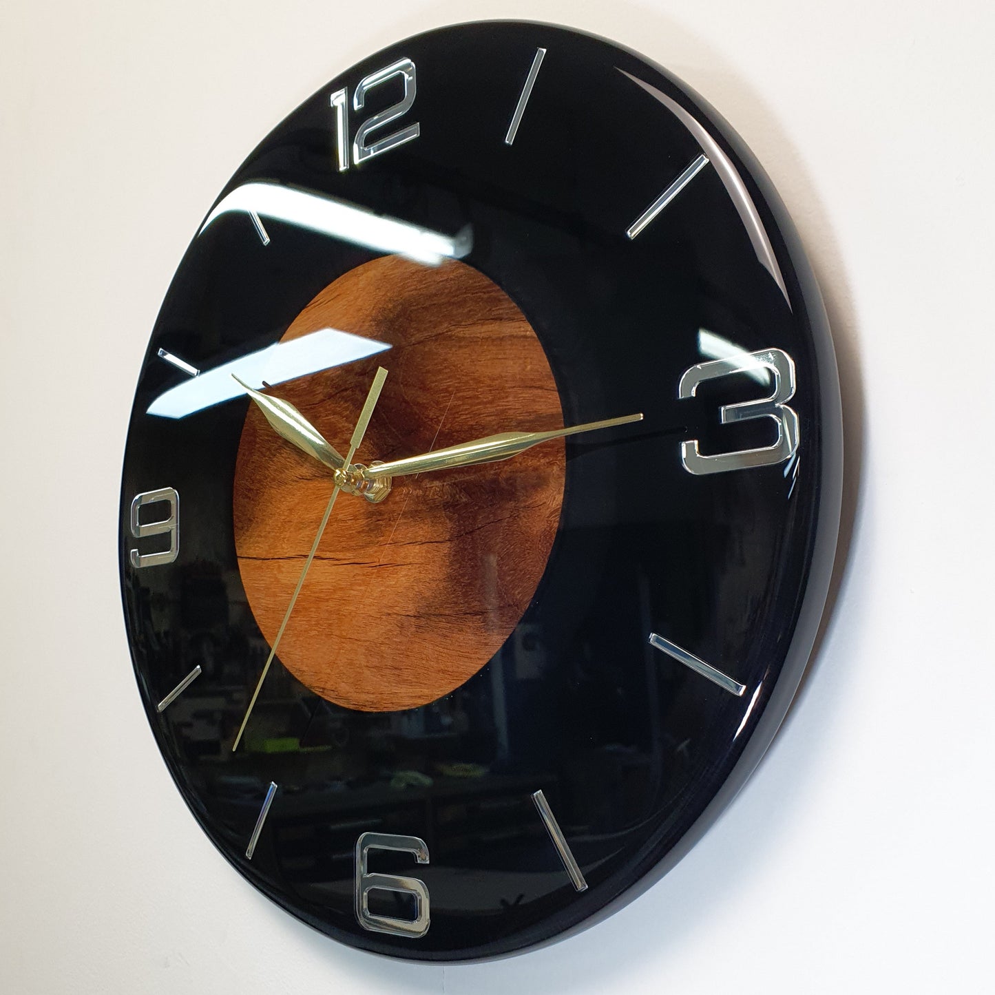 Left side view highlighting the smooth resin curve and glossy finish