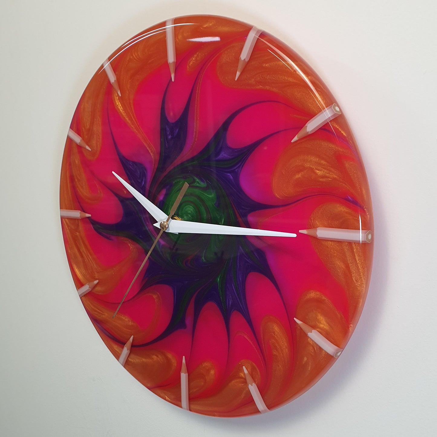 Left side view highlighting the depth of the spiral design and white plexiglass hour markers