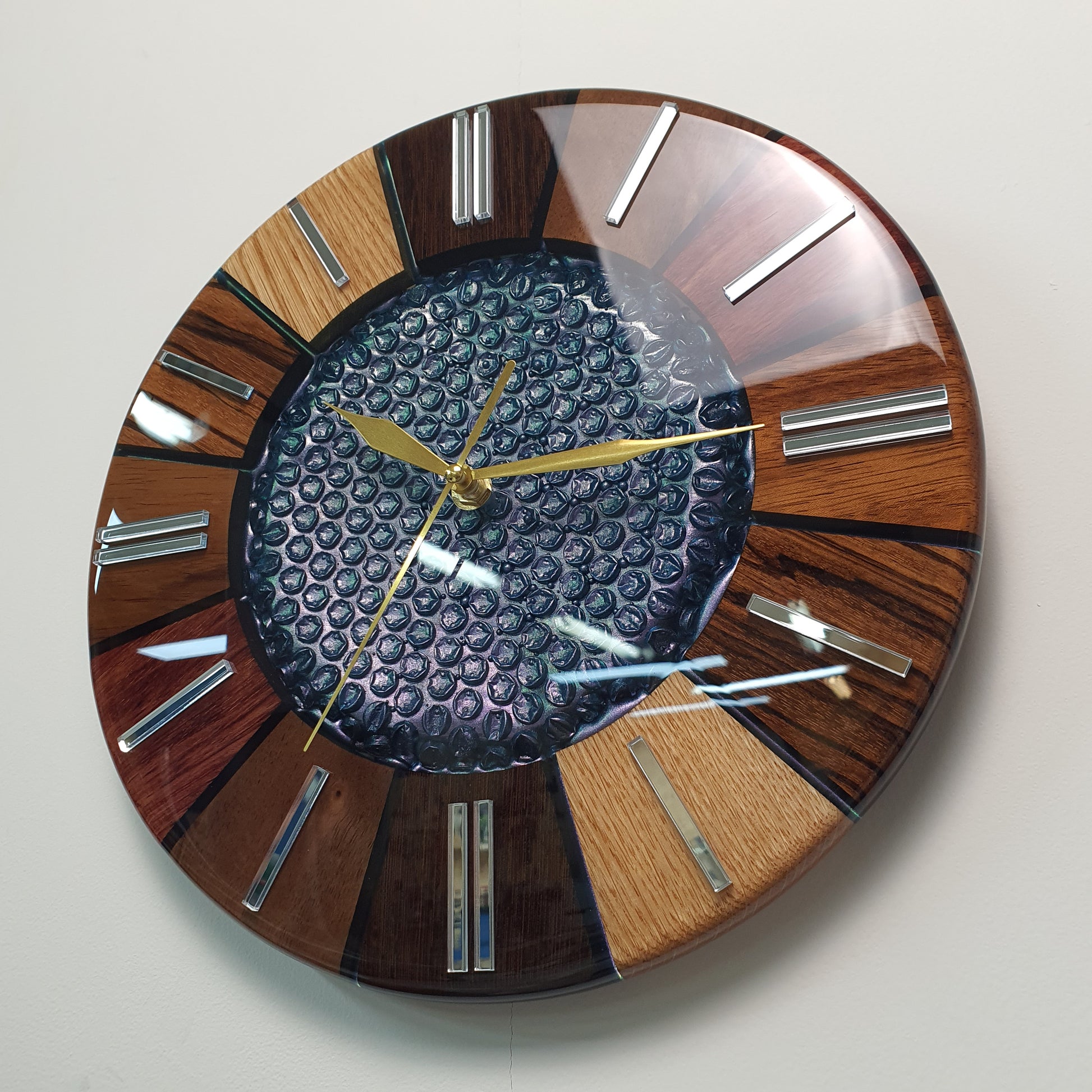 Angled side view capturing the curvature of the resin surface and color reflections