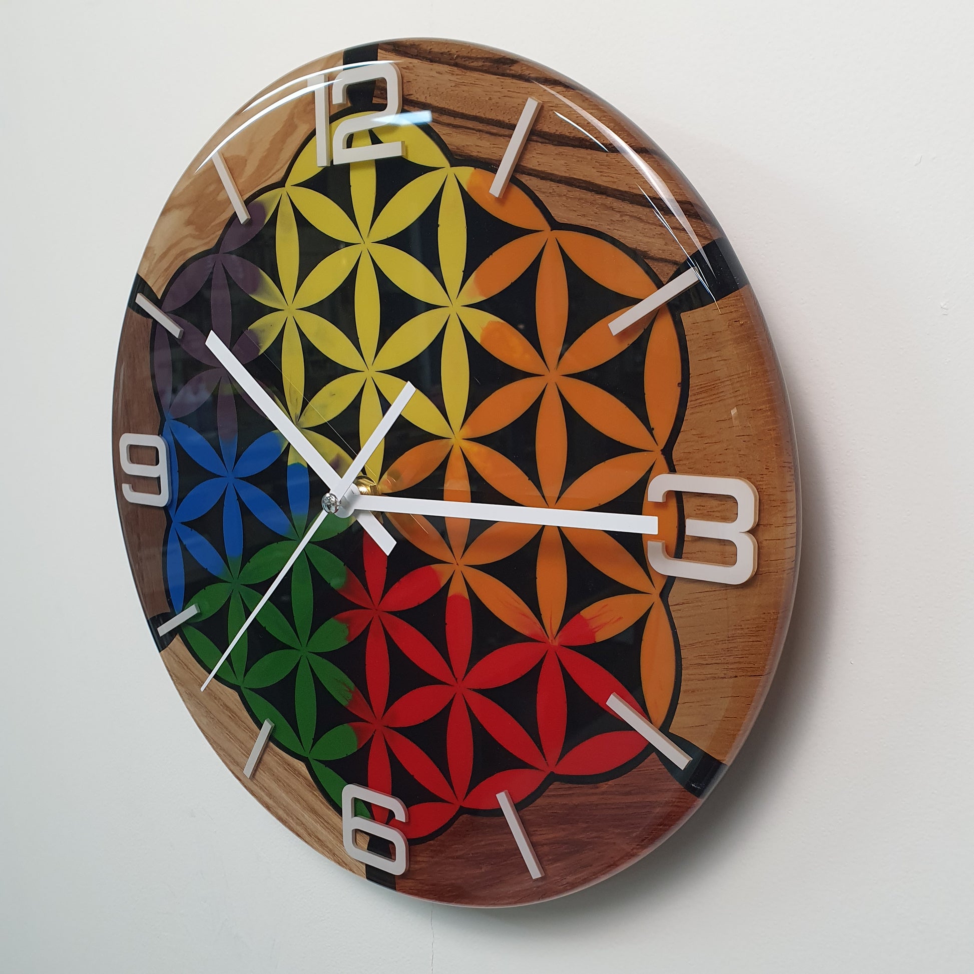 Side angle view showing wood and numerals embedded in epoxy resin