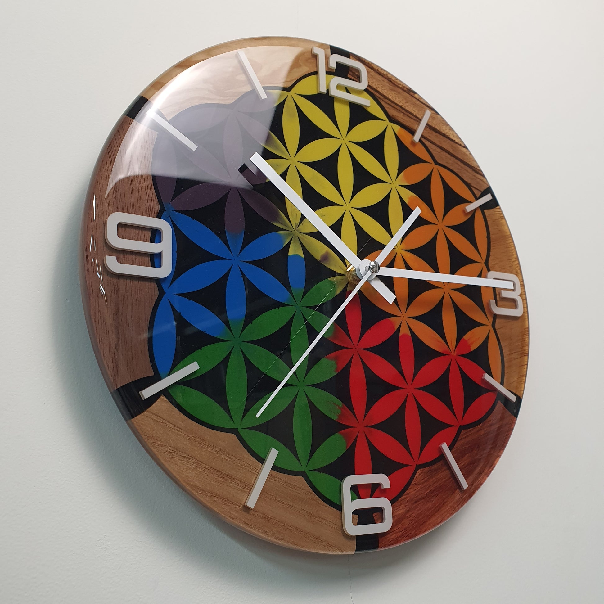 Detail of white plexiglass numerals inside resin surface