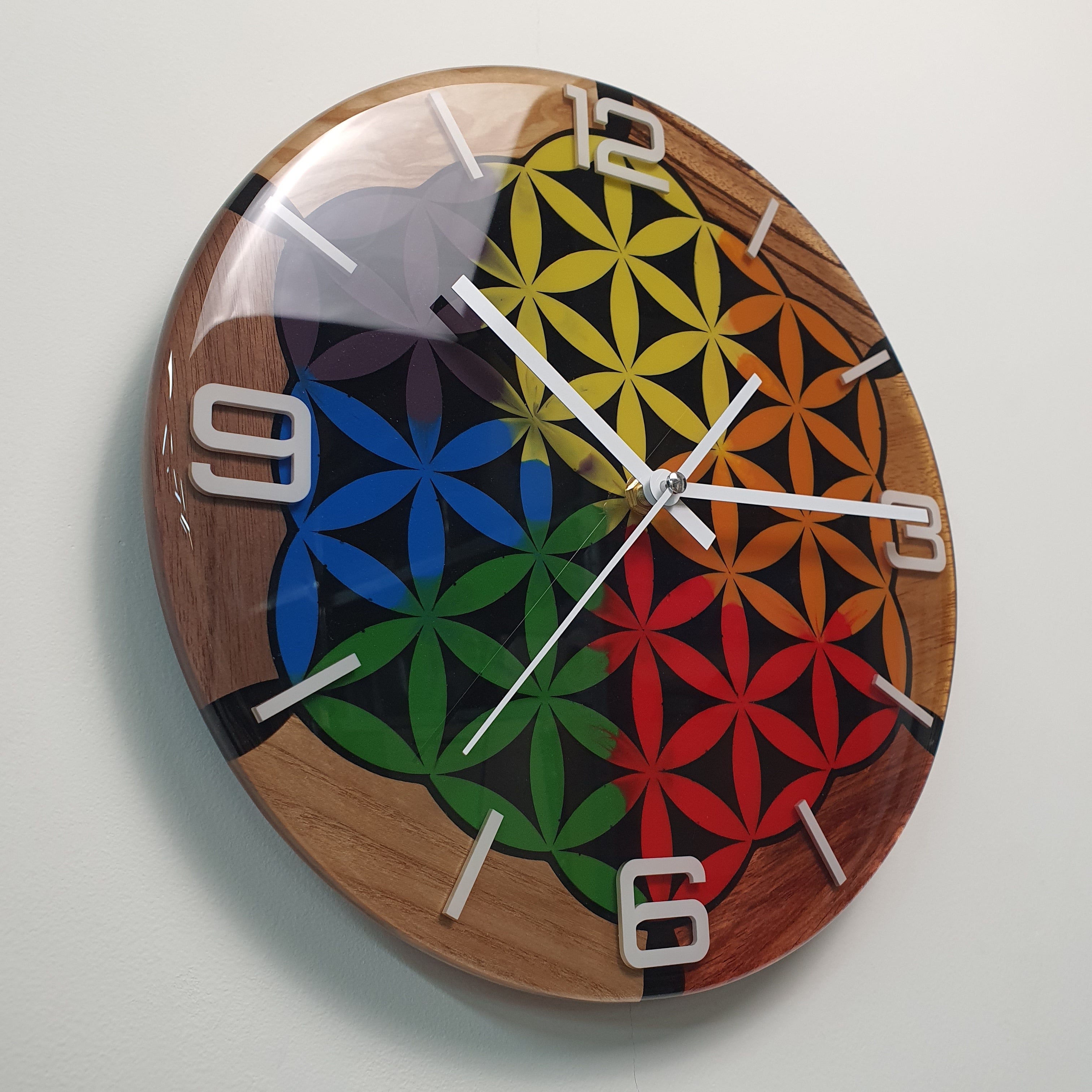 Detail of white plexiglass numerals inside resin surface