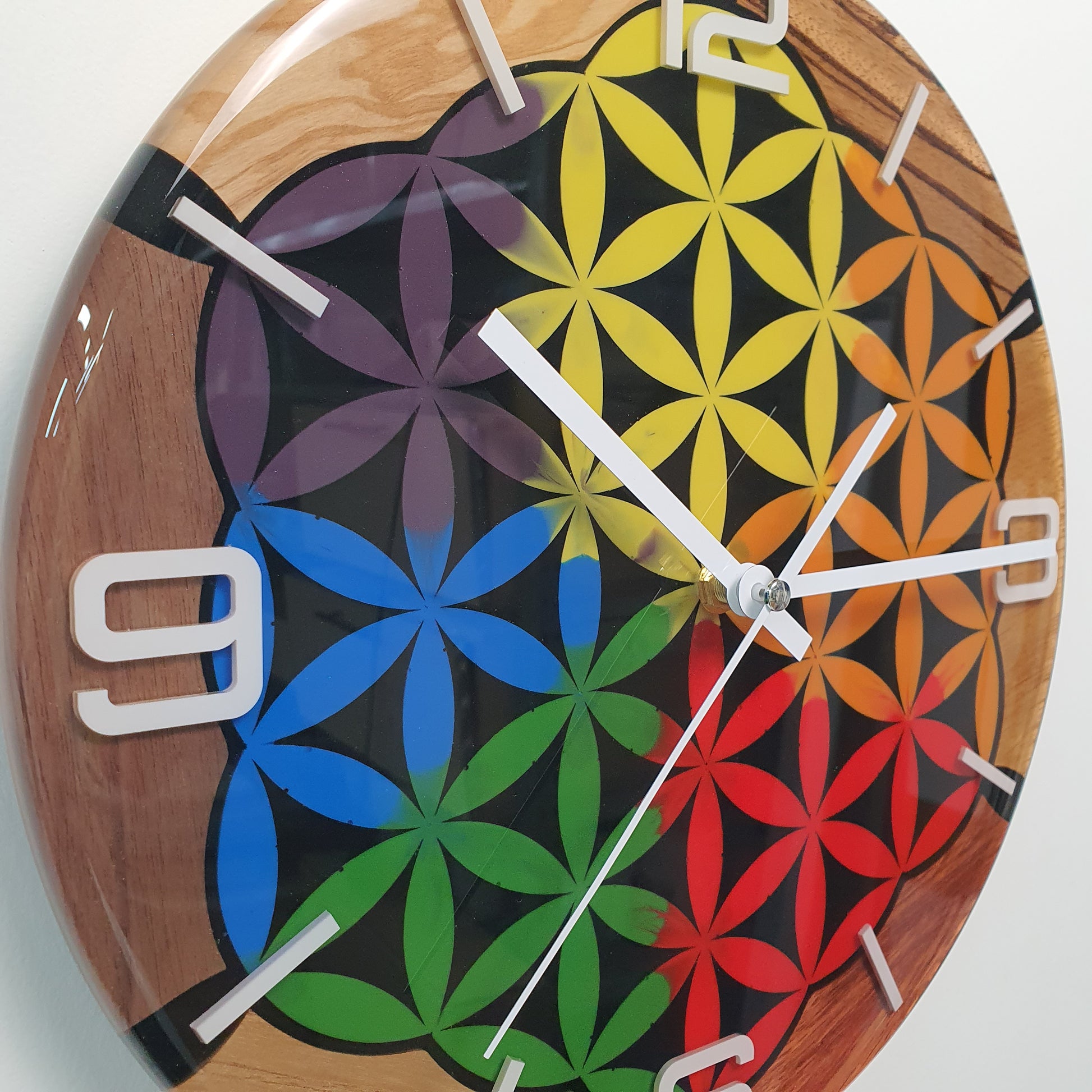 Close-up of geometric Flower of Life pattern embedded in resin