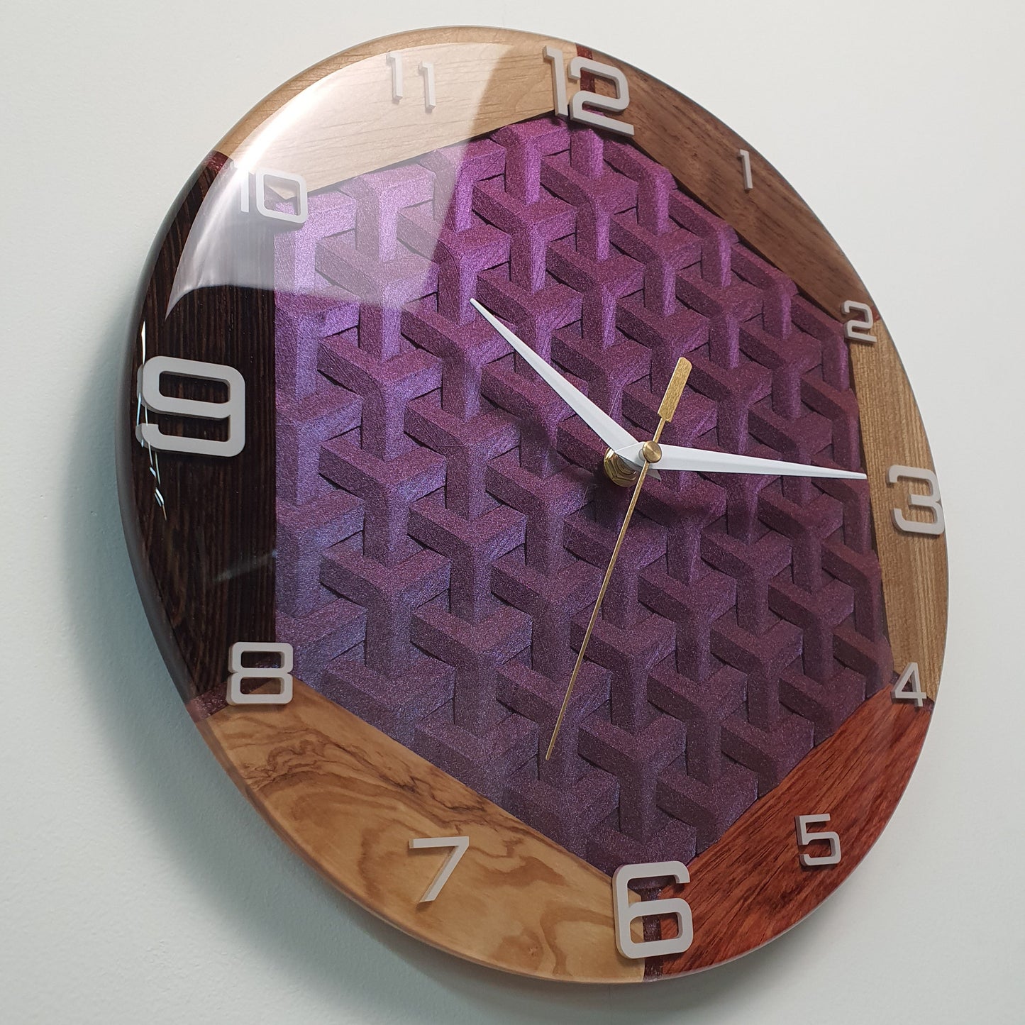 Modern wood clock combining multiple wood types and resin