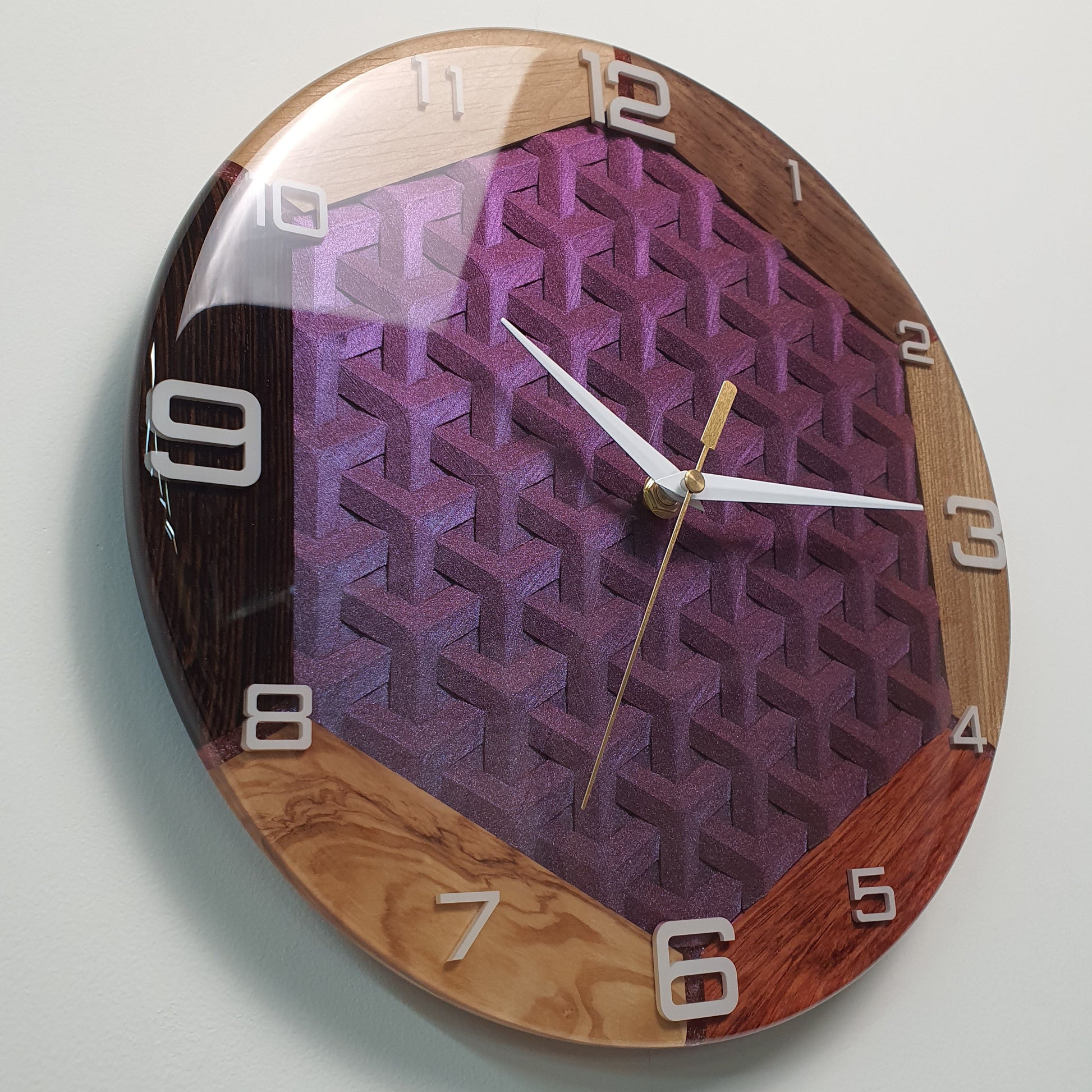 Modern wood clock combining multiple wood types and resin