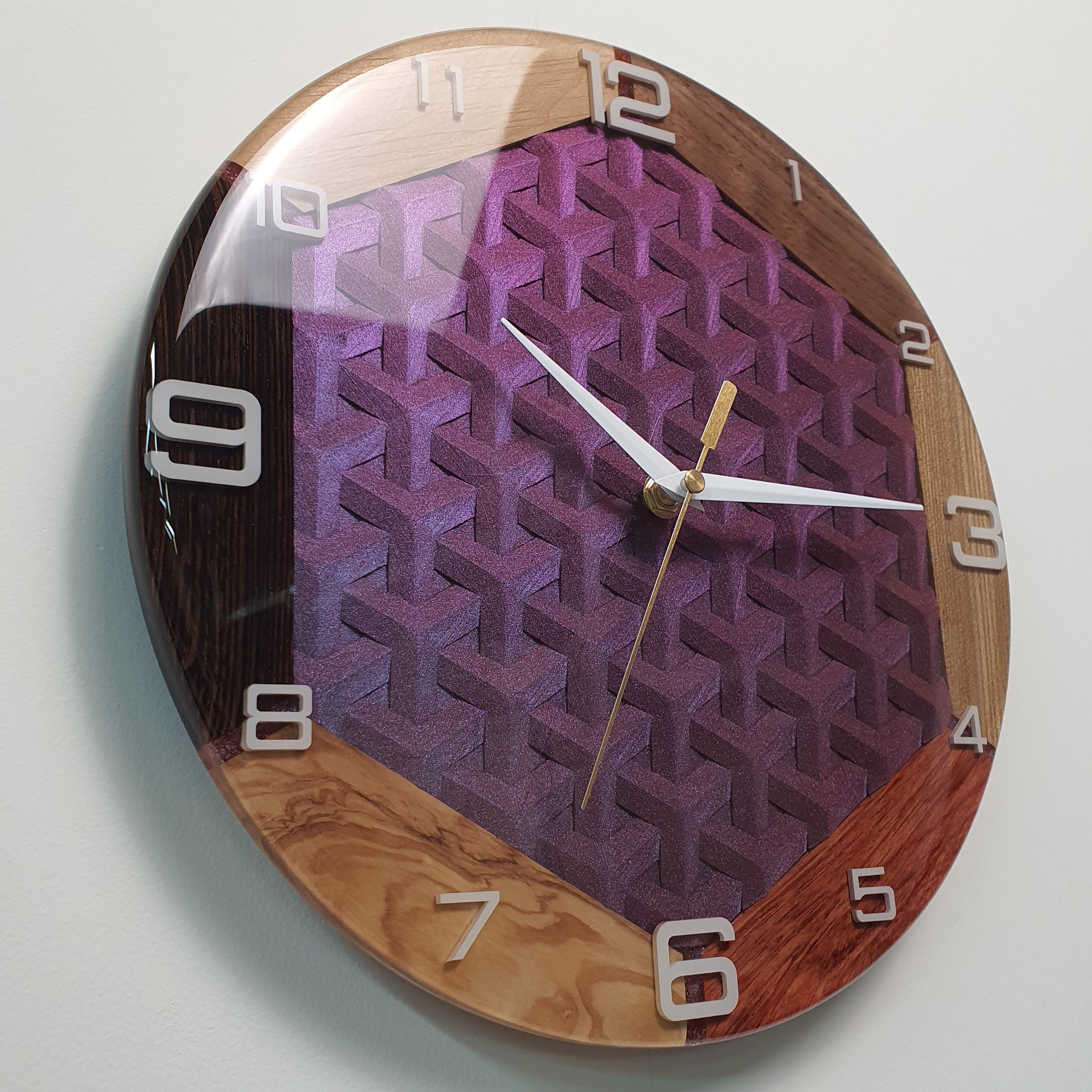 Modern wood clock combining multiple wood types and resin