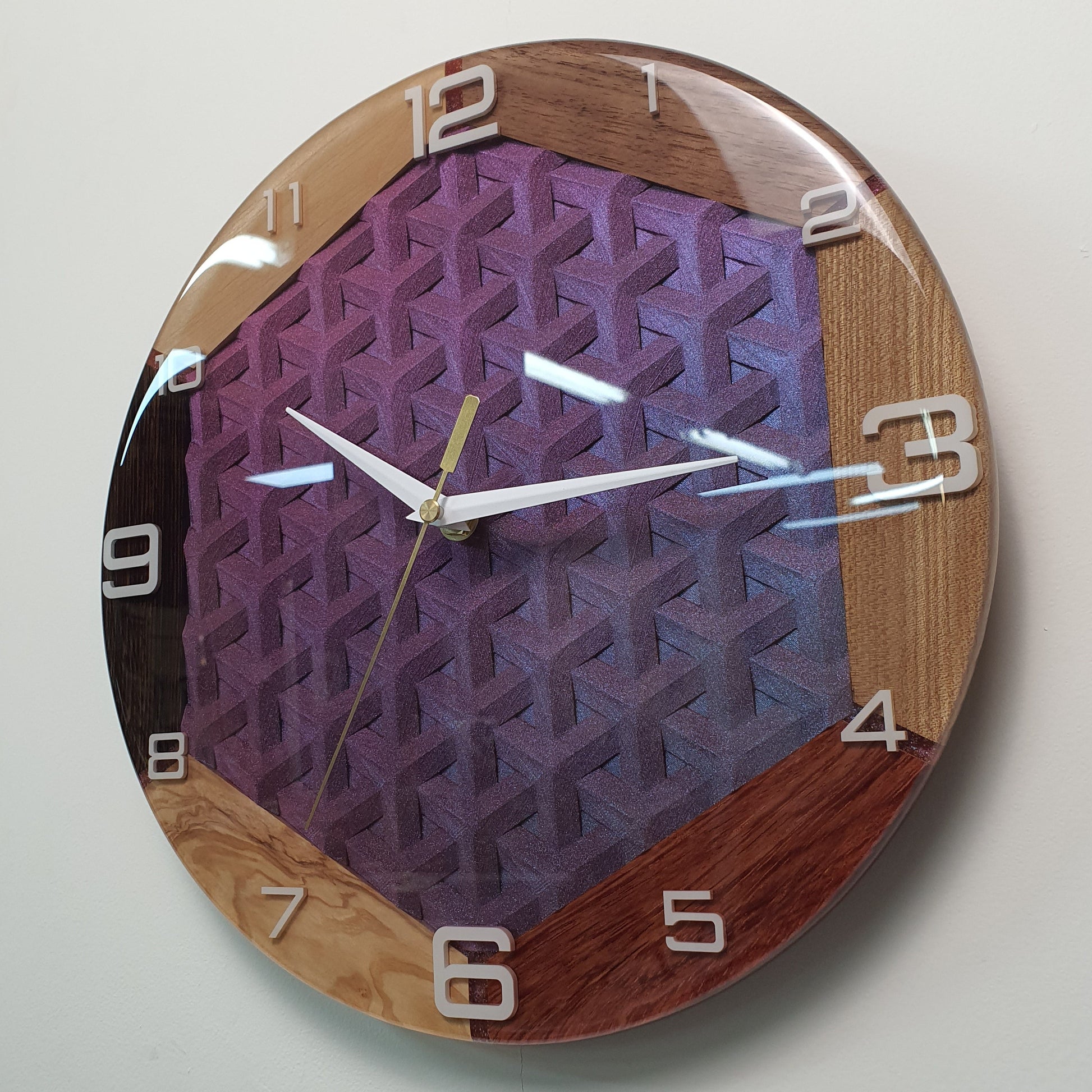 Side angle showing layered wood frame and glossy finish