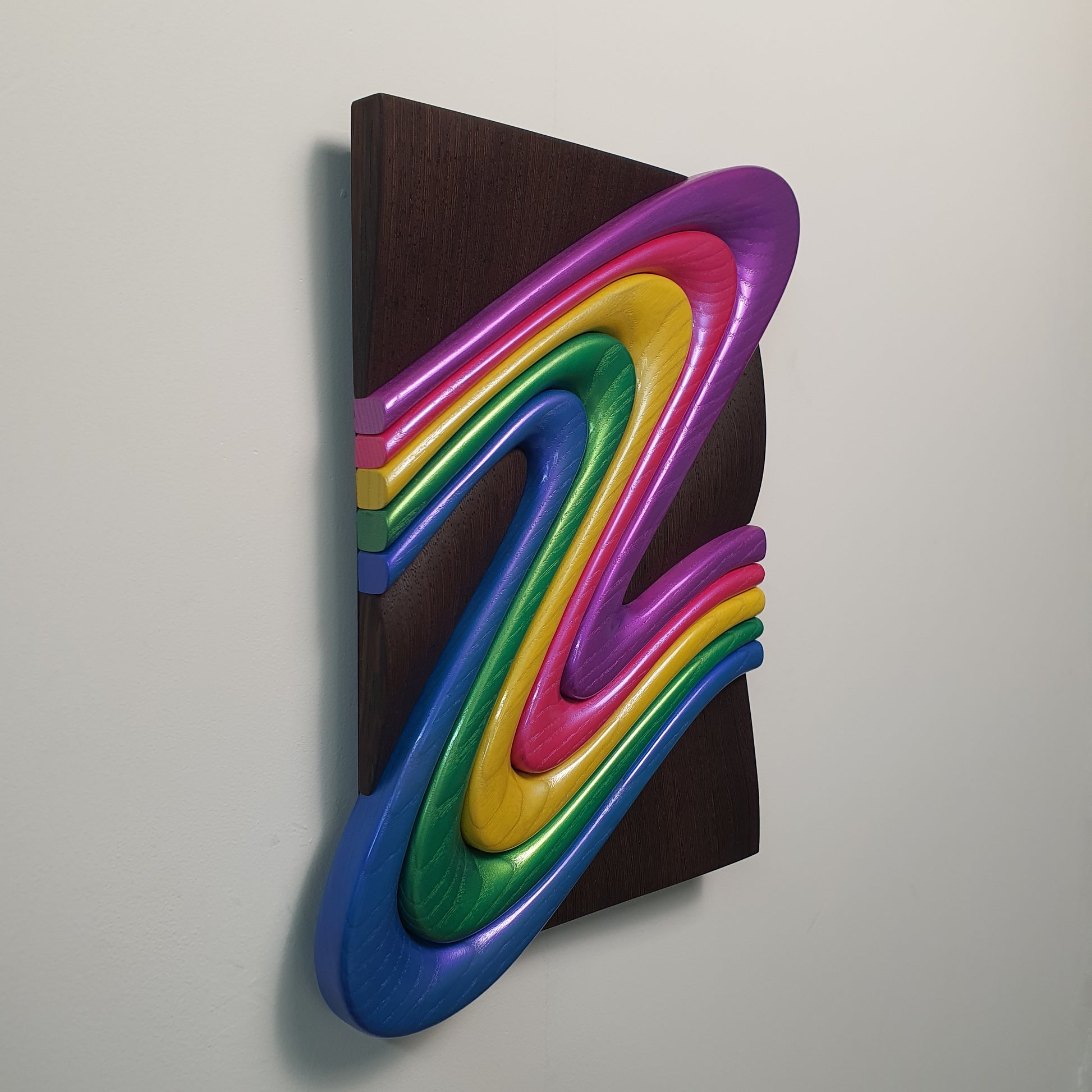 Z Frozen Motion side view highlighting three dimensional carved ash wood