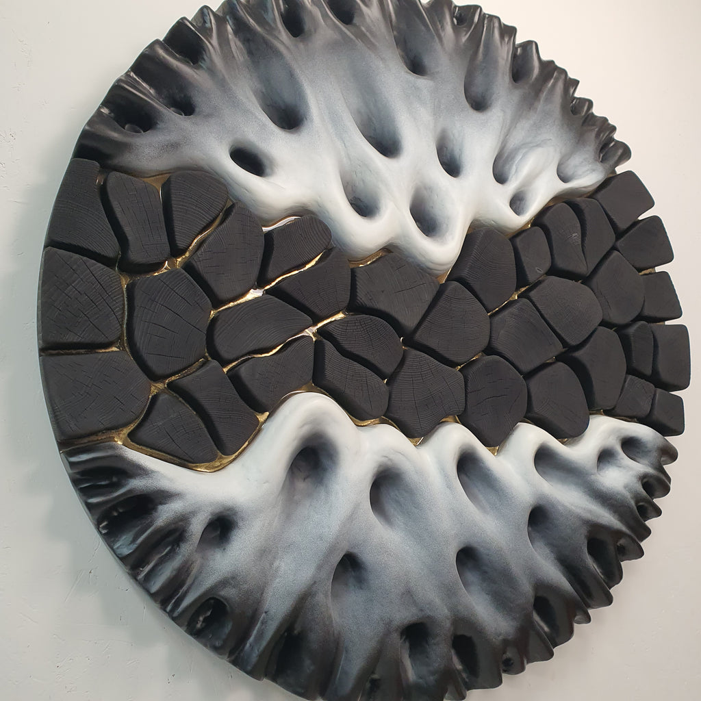 Side angle of 3D wall sculpture showing layered structure and thickness