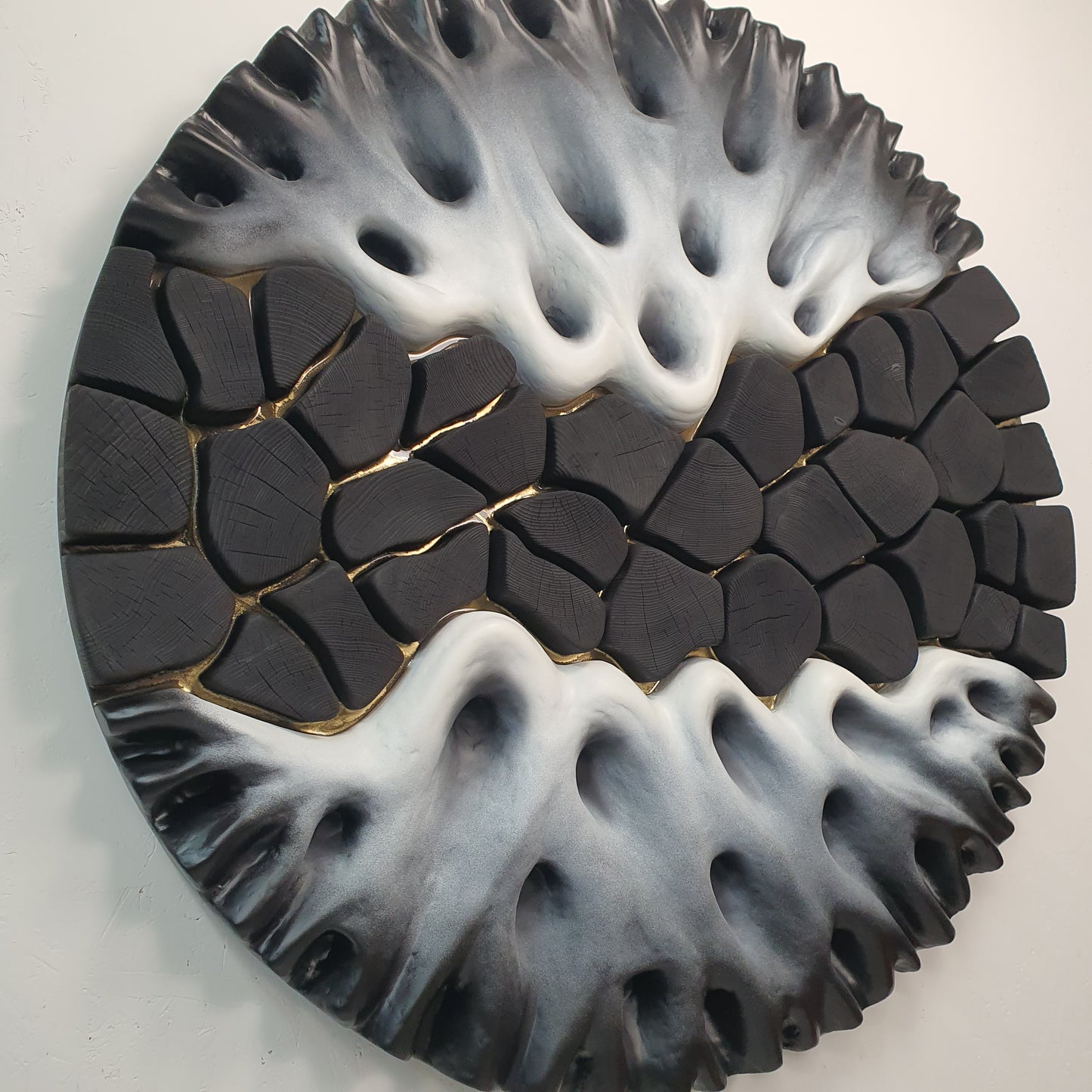 Side angle of 3D wall sculpture showing layered structure and thickness