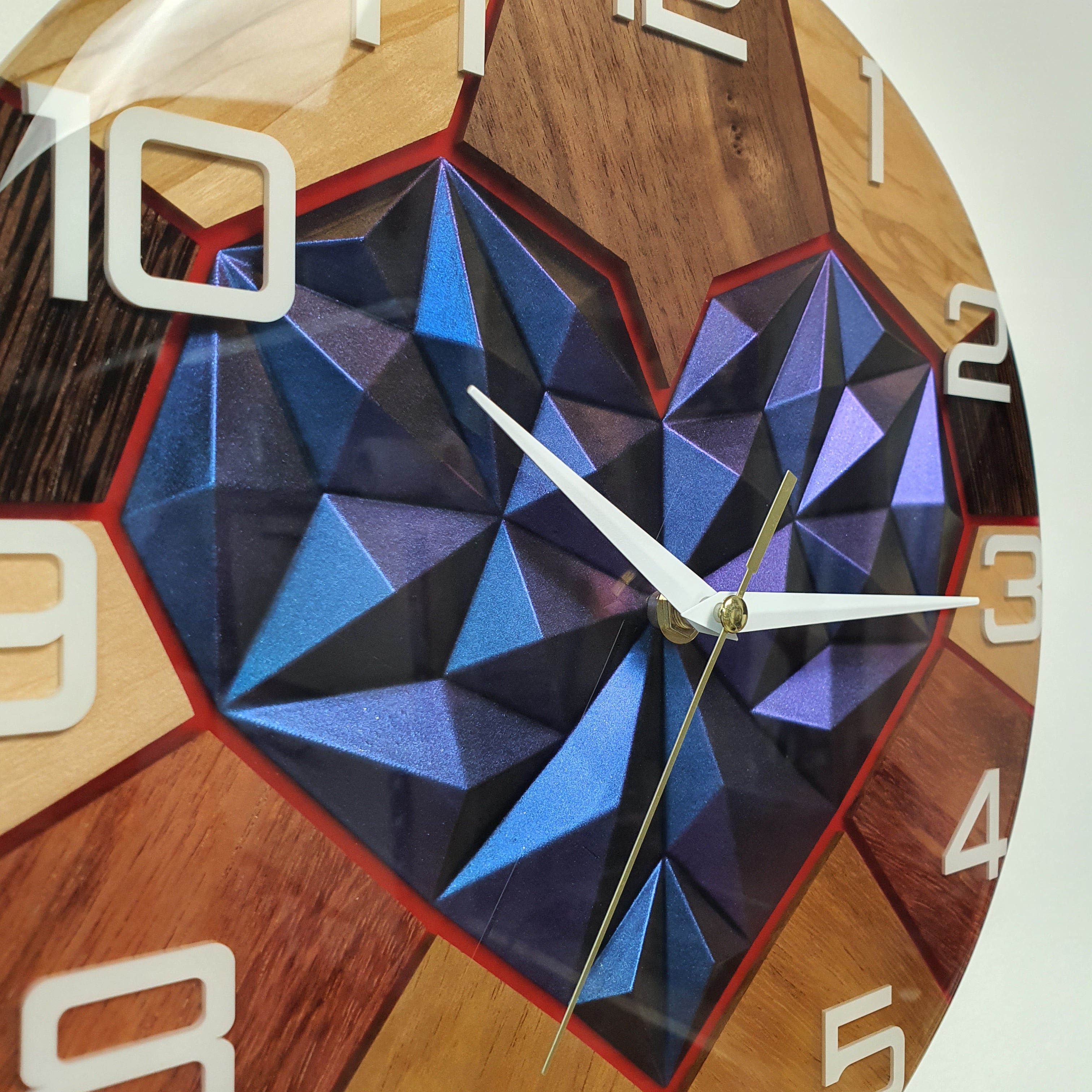 Close-up of chameleon pigment heart centerpiece embedded in clear epoxy resin