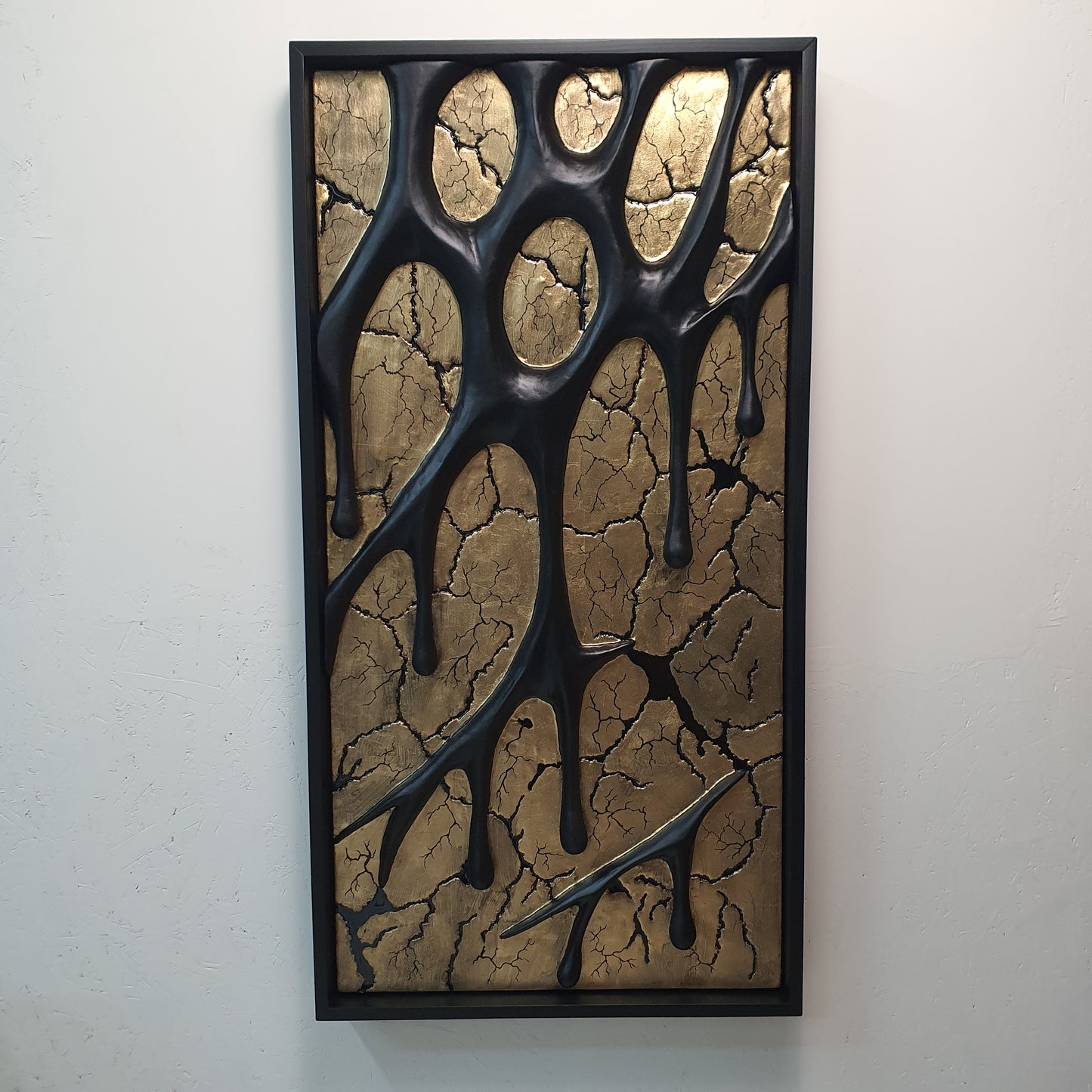 modern abstract wall sculpture with gold cracked texture front view