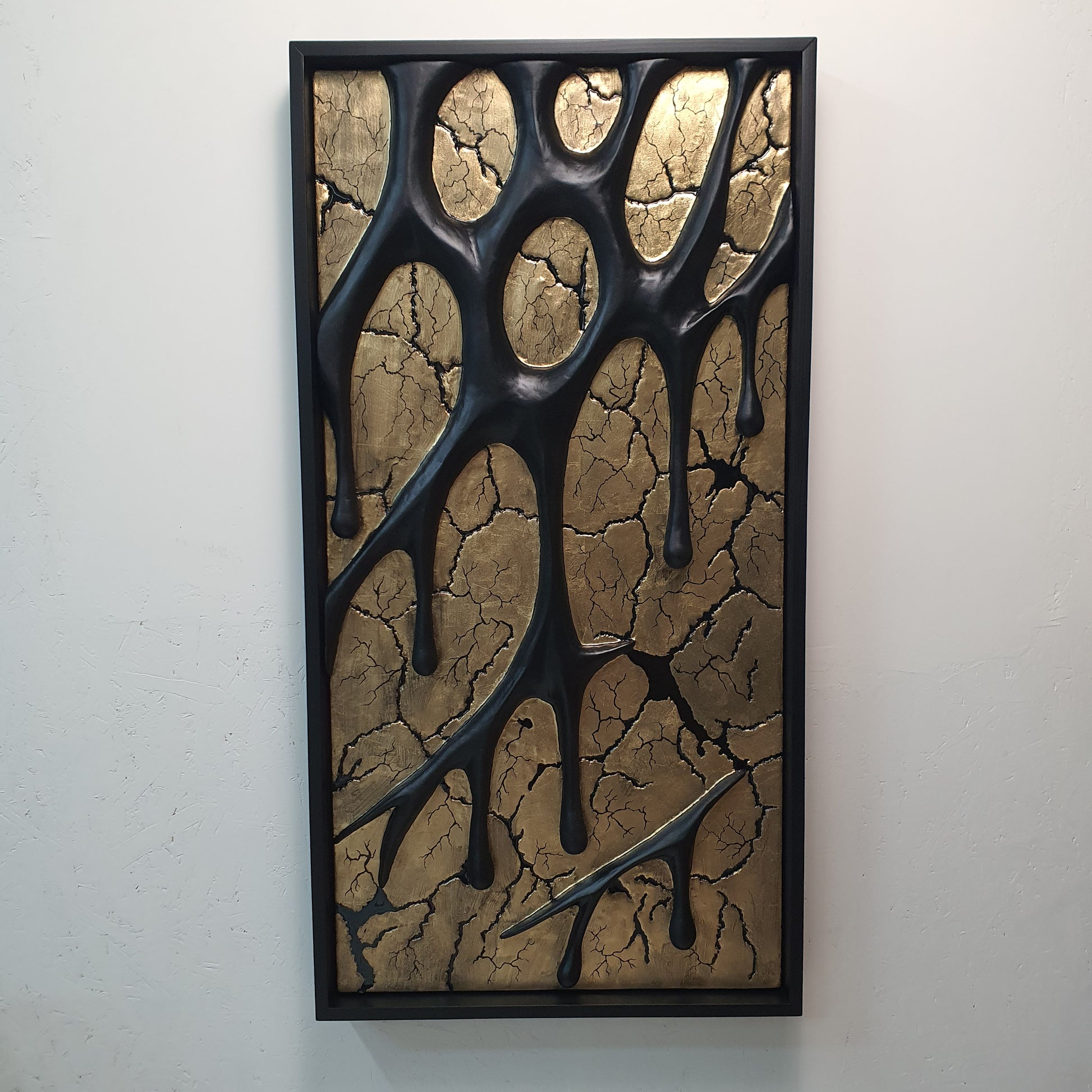 modern abstract wall sculpture with gold cracked texture front view