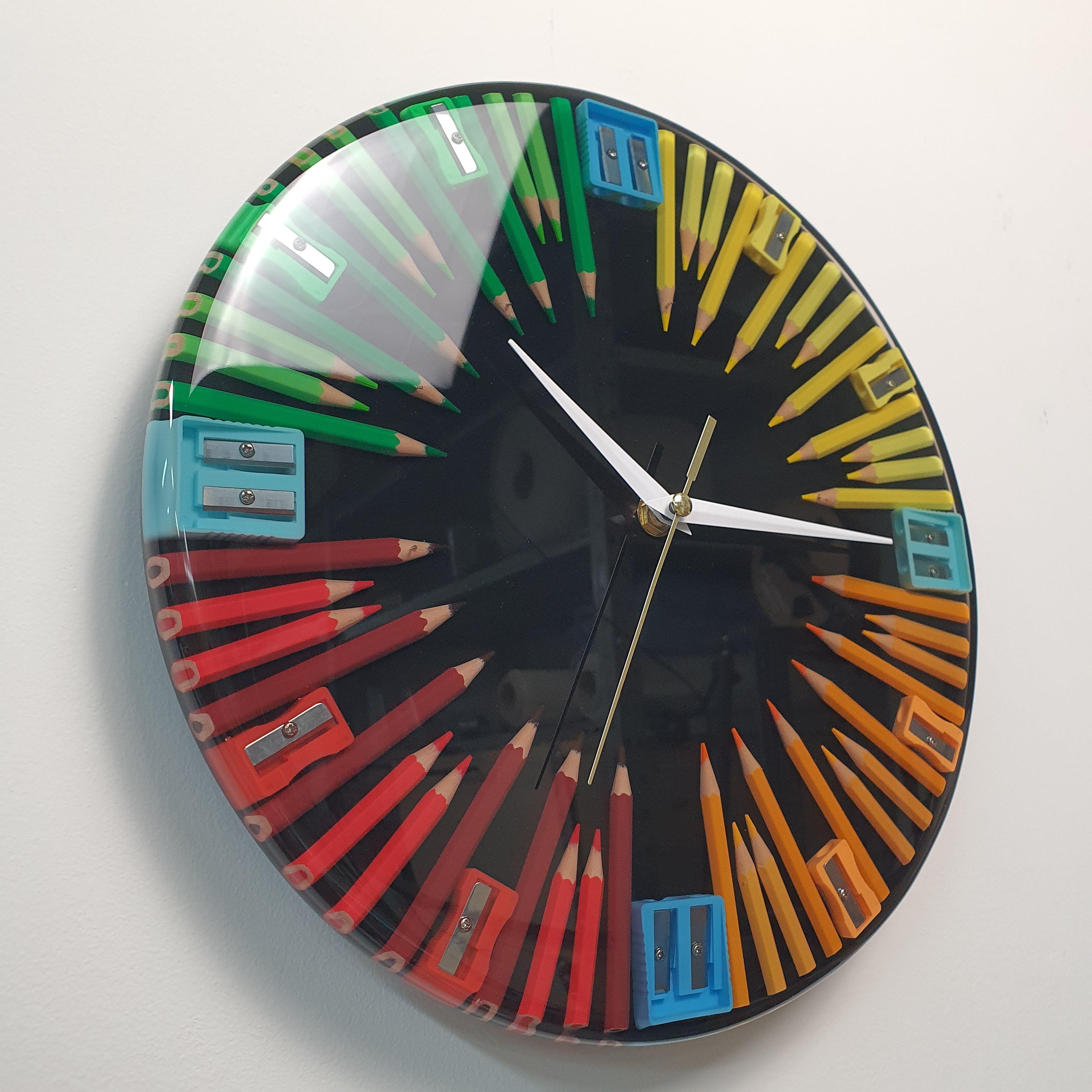Modern resin wall clock with swirling colored pencil composition