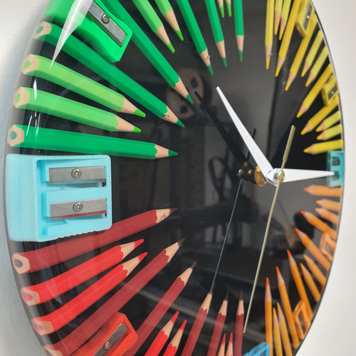 Close-up of colorful pencil shavings and sharpeners embedded in epoxy resin