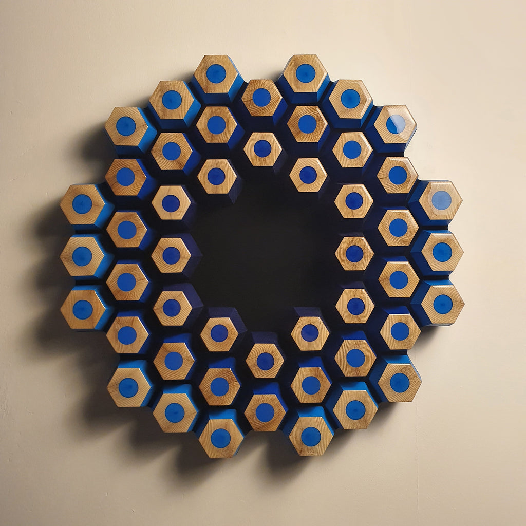 Contemporary geometric wall sculpture with blue gradient and ultra matte black center by Krzysztof Gostkowski