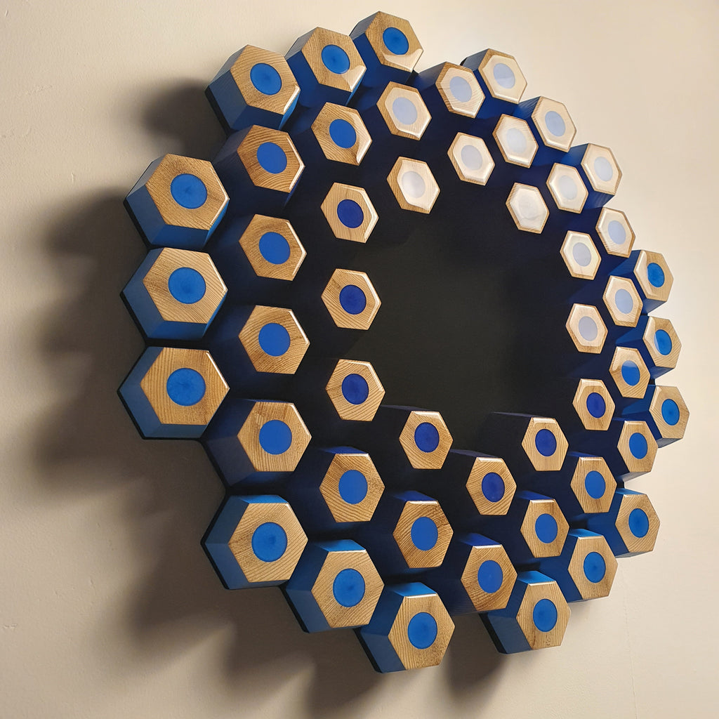 Abstract modular wall sculpture from the Profondità series with blue tones and spatial depth